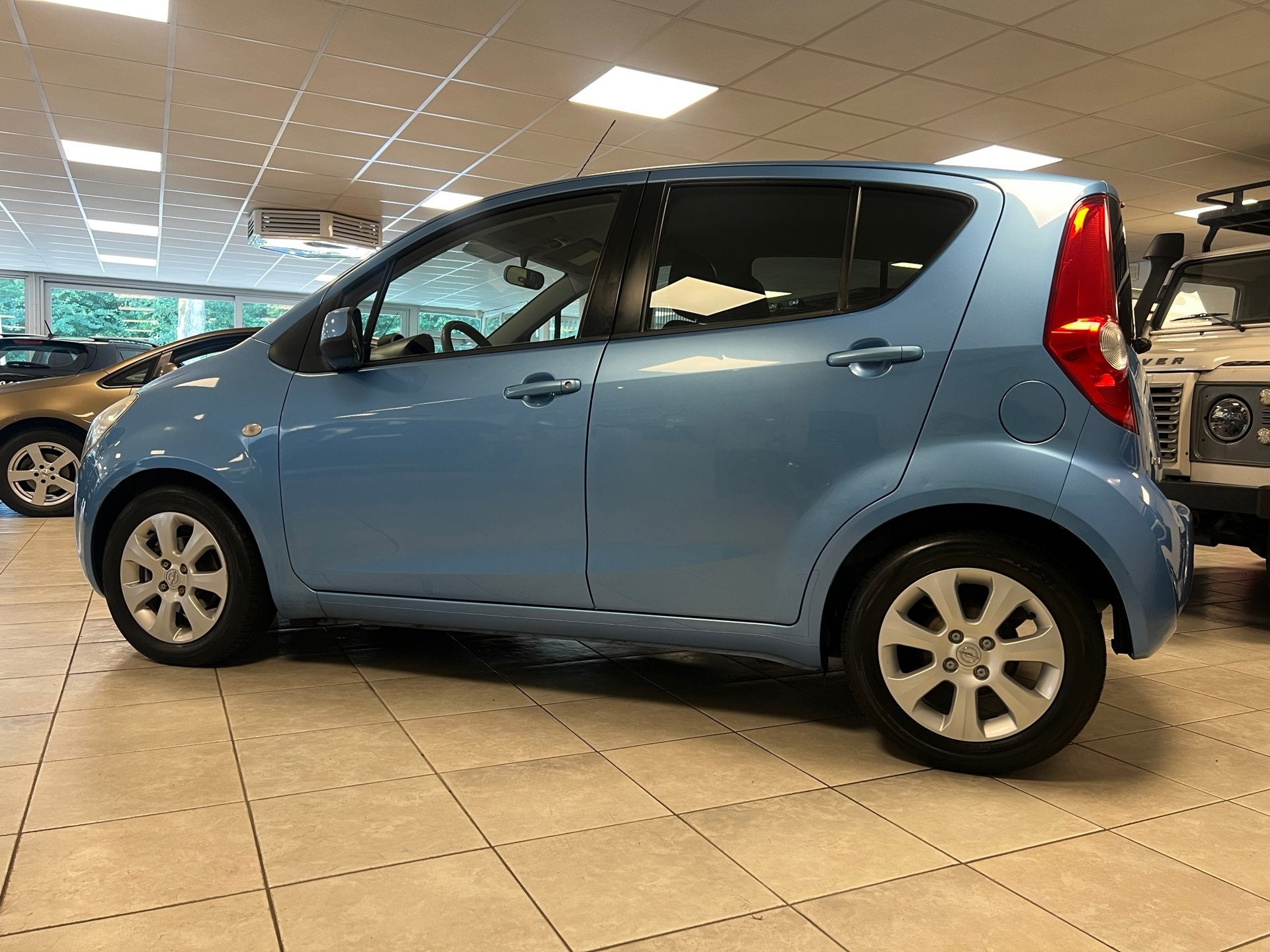 Opel Agila 1.0 Enjoy Airco, Stof, Gebruikt, Blauw, 996 cc