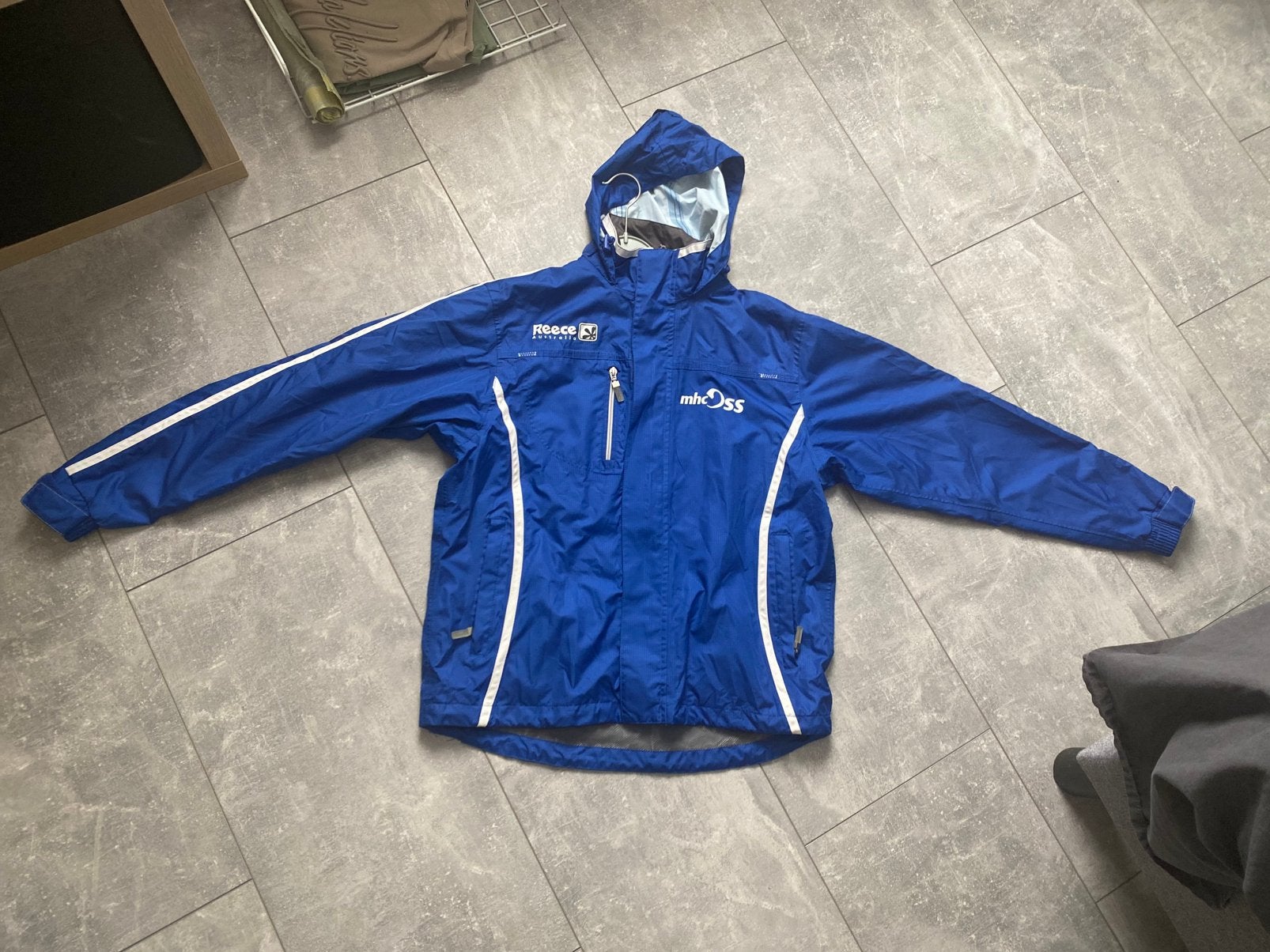 Reece hockey regenjas mhc oss in goede staat maat s, Ophalen of Verzenden, Zo goed als nieuw, Kleding