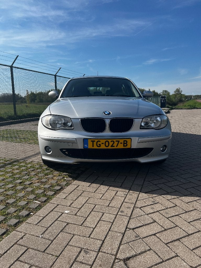 BMW 118i | Stoelverwarming | Schuif-/kanteldak | PDC | 5 drs, 1-Serie, 1995 cc, 1225 kg, 129 pk