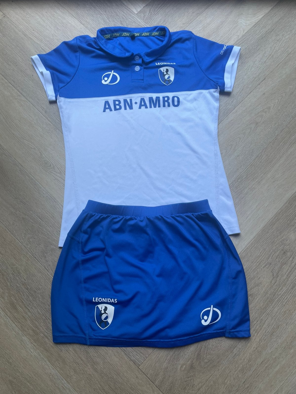 Leonidas hockey shirt + rokje meisjes – maat 164, Ophalen, Zo goed als nieuw, Kleding