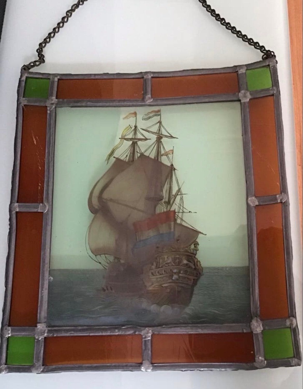 Glas in lood raamhanger VOC schip, Ophalen