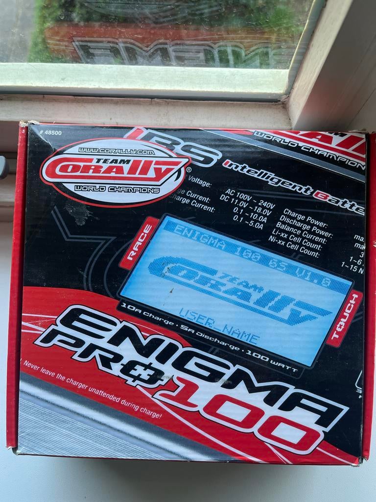 Corally Enigma Pro 100 lader, Ophalen of Verzenden, Zo goed als nieuw