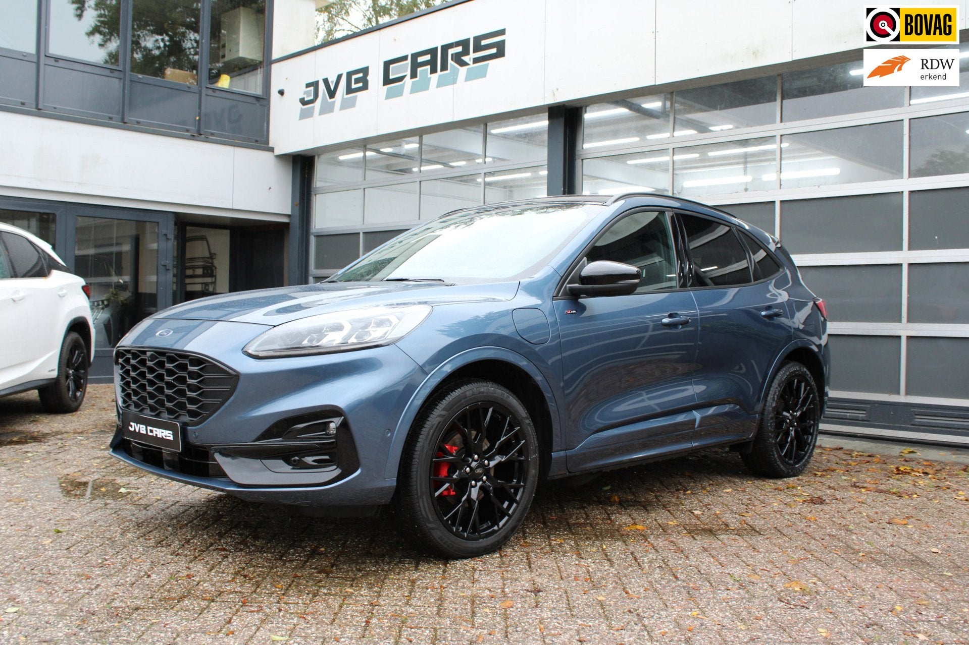 Ford Kuga 2.5 PHEV ST-Line X, Auto's, Automaat, Gebruikt, Zwart, Blauw
