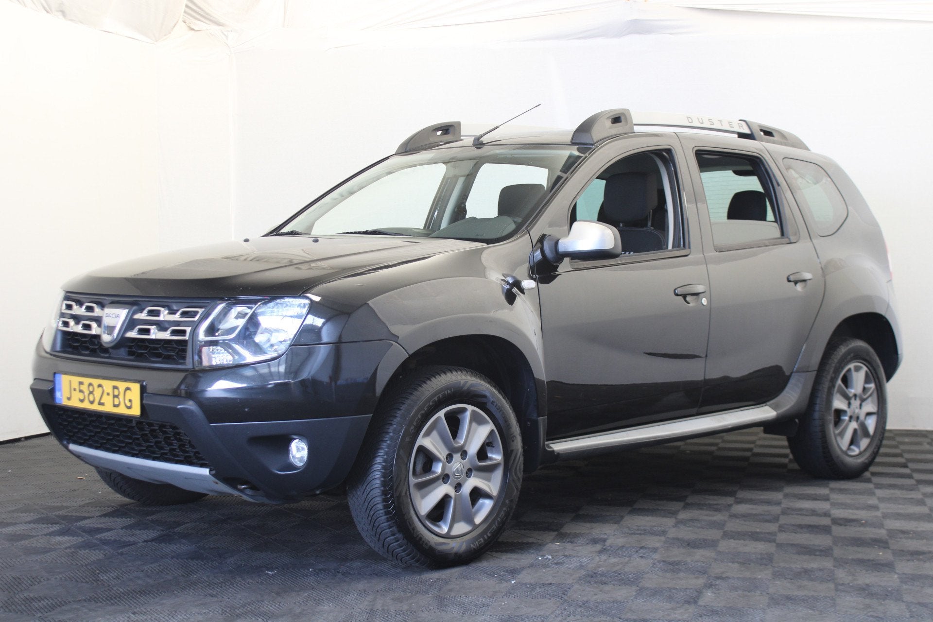 Dacia Duster 1.2 TCe 4x2 Prestige (bj 2014), Voorwielaandrijving, Euro 5, Stof, Gebruikt