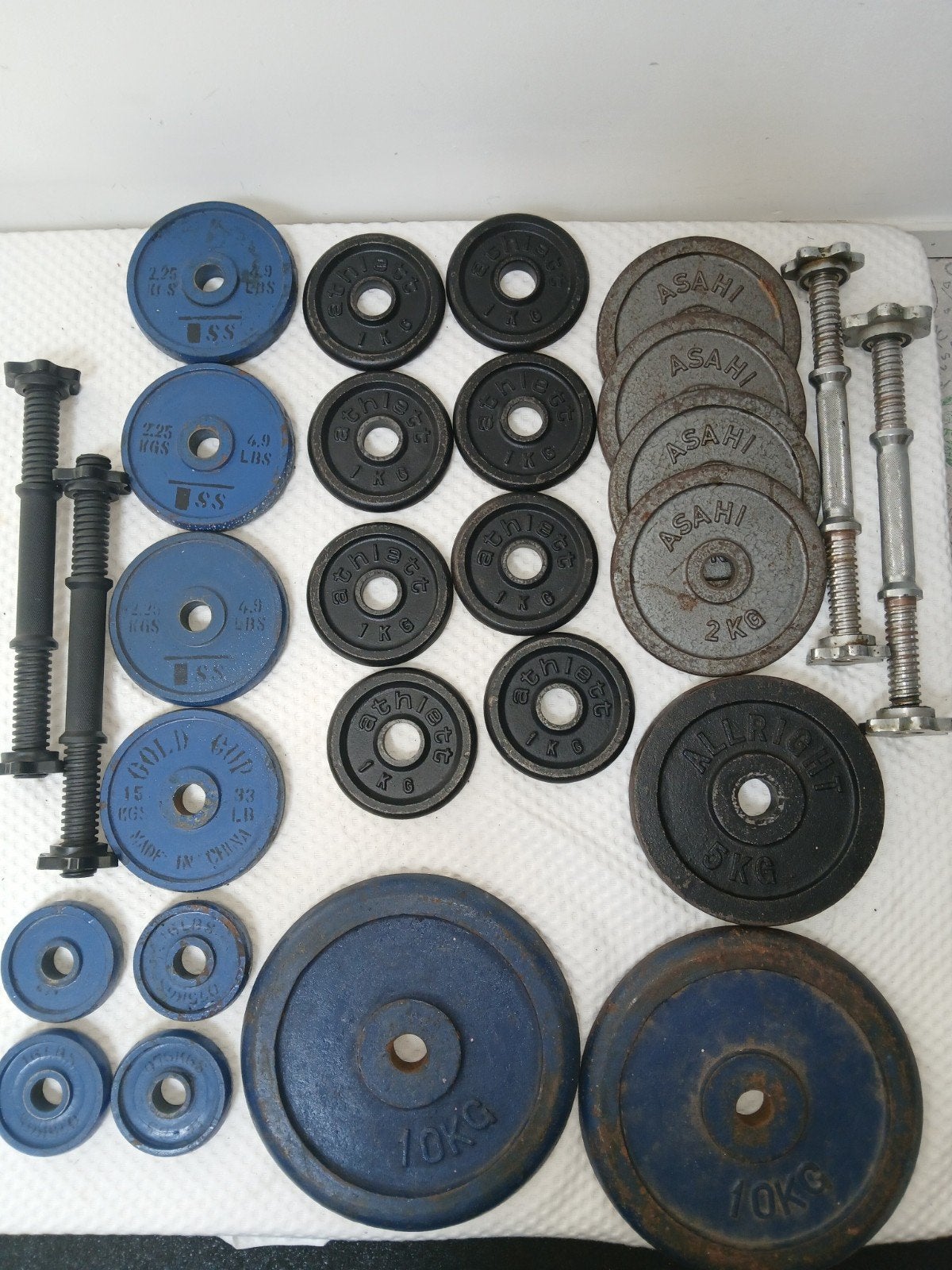 Verschillende gewichschijven en dumbells, Ophalen, Gebruikt, Benen, Dumbbell