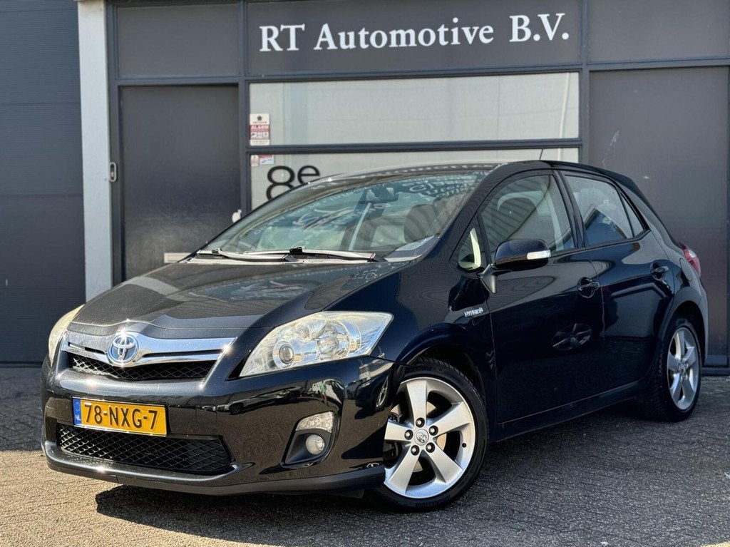 Toyota Auris 1.8 Full Hybrid Executive Navi/Leder Dealer OH, Auto's, Toyota, Euro 5, 136 pk, Gebruikt, 4 cilinders
