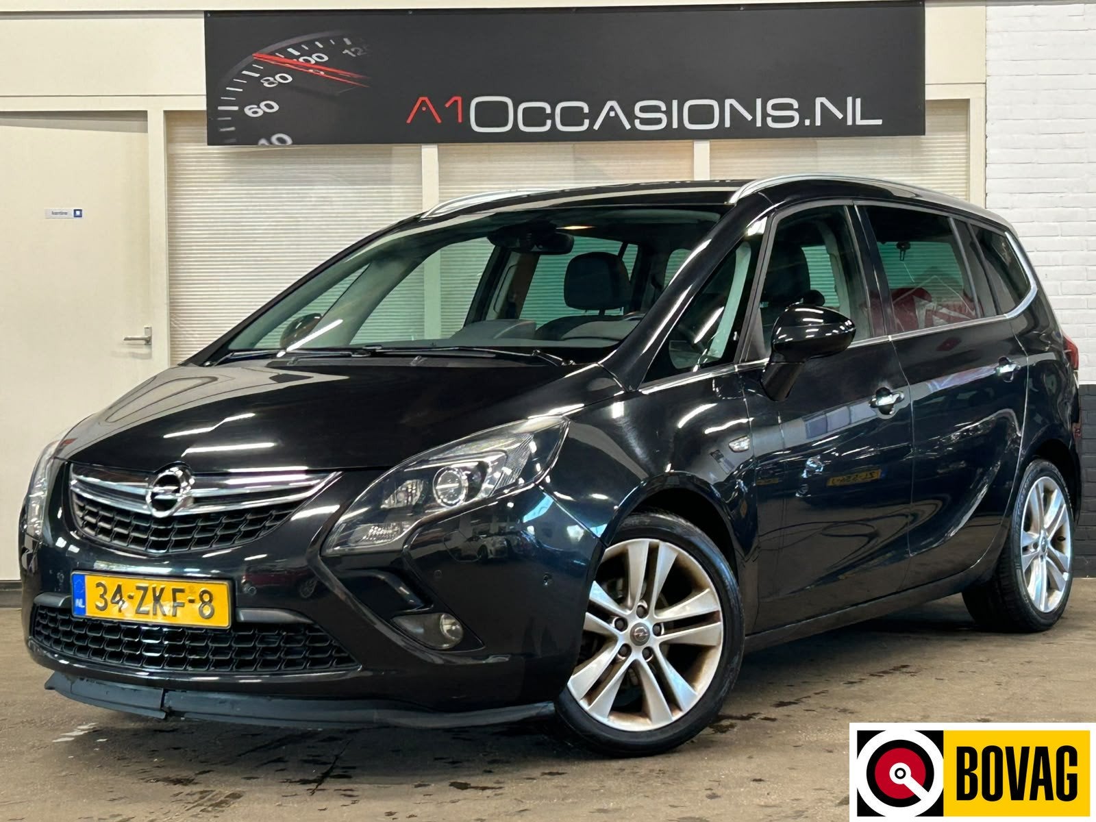Opel Zafira Tourer 1.4 Cosmo NAVI (bj 2012), Auto's, Euro 5, Leder en Stof, Zwart, Origineel Nederlands