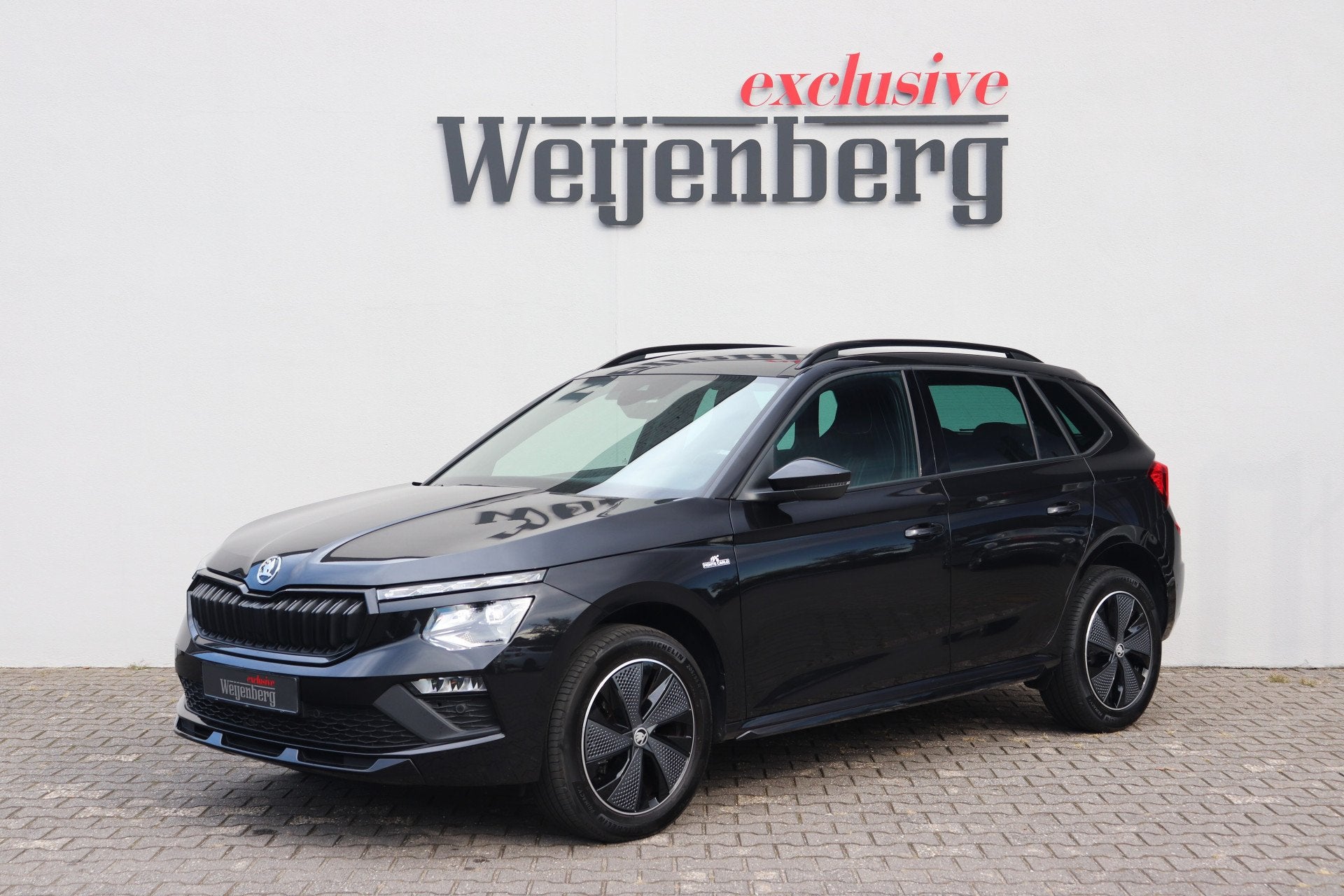 Skoda Kamiq 1.0 TSI Monte Carlo Pano ACC Camera (bj 2026), Auto's, 12 maanden, Stof, Gebruikt, Zwart