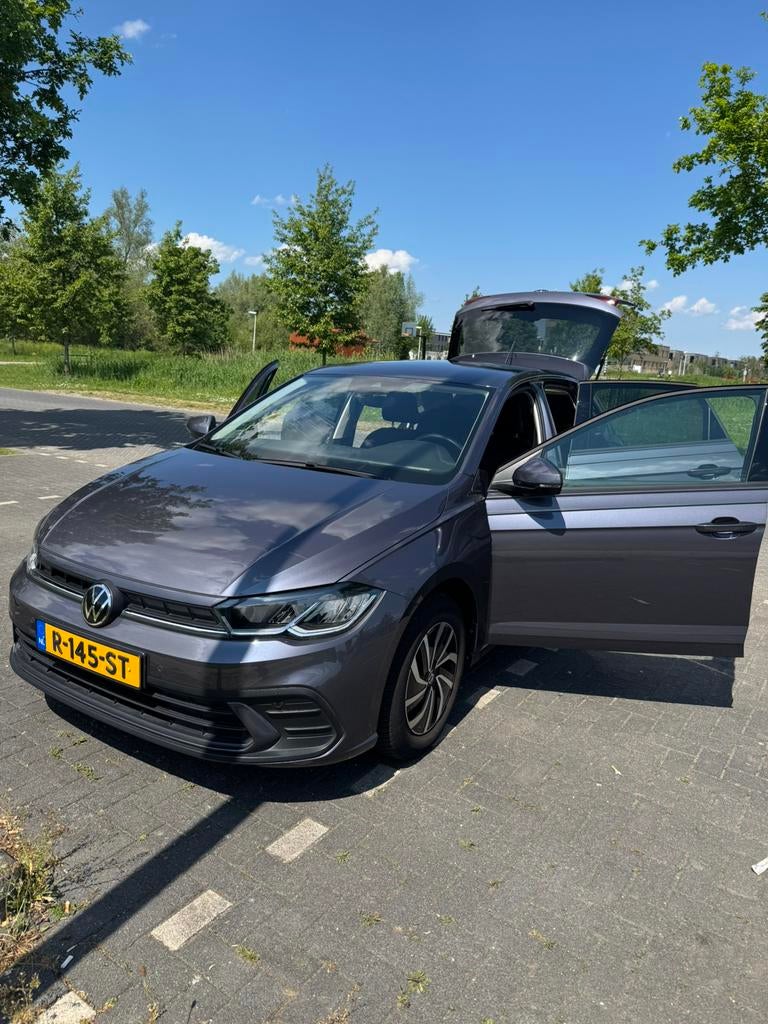 Volkswagen Polo 1.0 TSI 95pk 2022 Grijs, Auto's, Voorwielaandrijving, Adaptieve lichten, Stof, 1072 kg