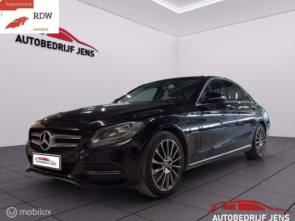 Mercedes C-klasse 200 Prestige, Auto's, Achterwielaandrijving, Gebruikt, Euro 6, Zwart