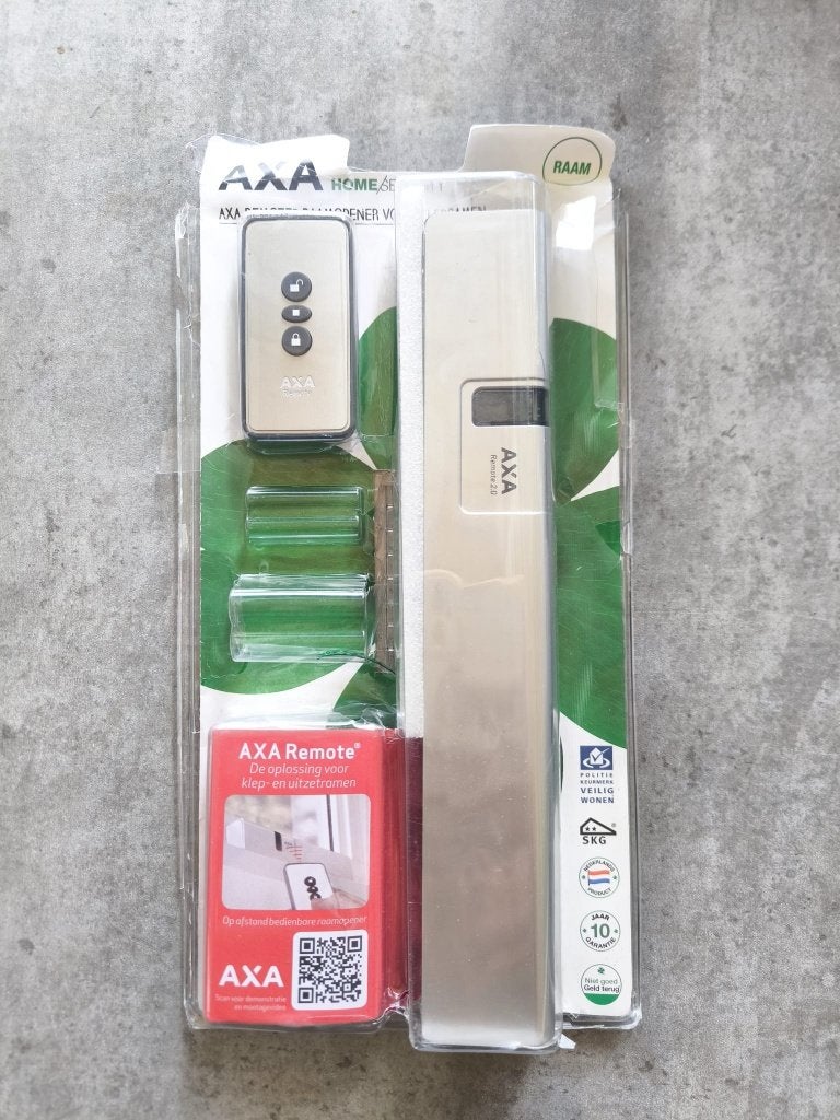 AXA Raamopener (Remote 2.0) Zilver: met afstandsbediening, Doe-het-zelf en Verbouw, Ophalen of Verzenden, Nieuw, Rvs, Slot