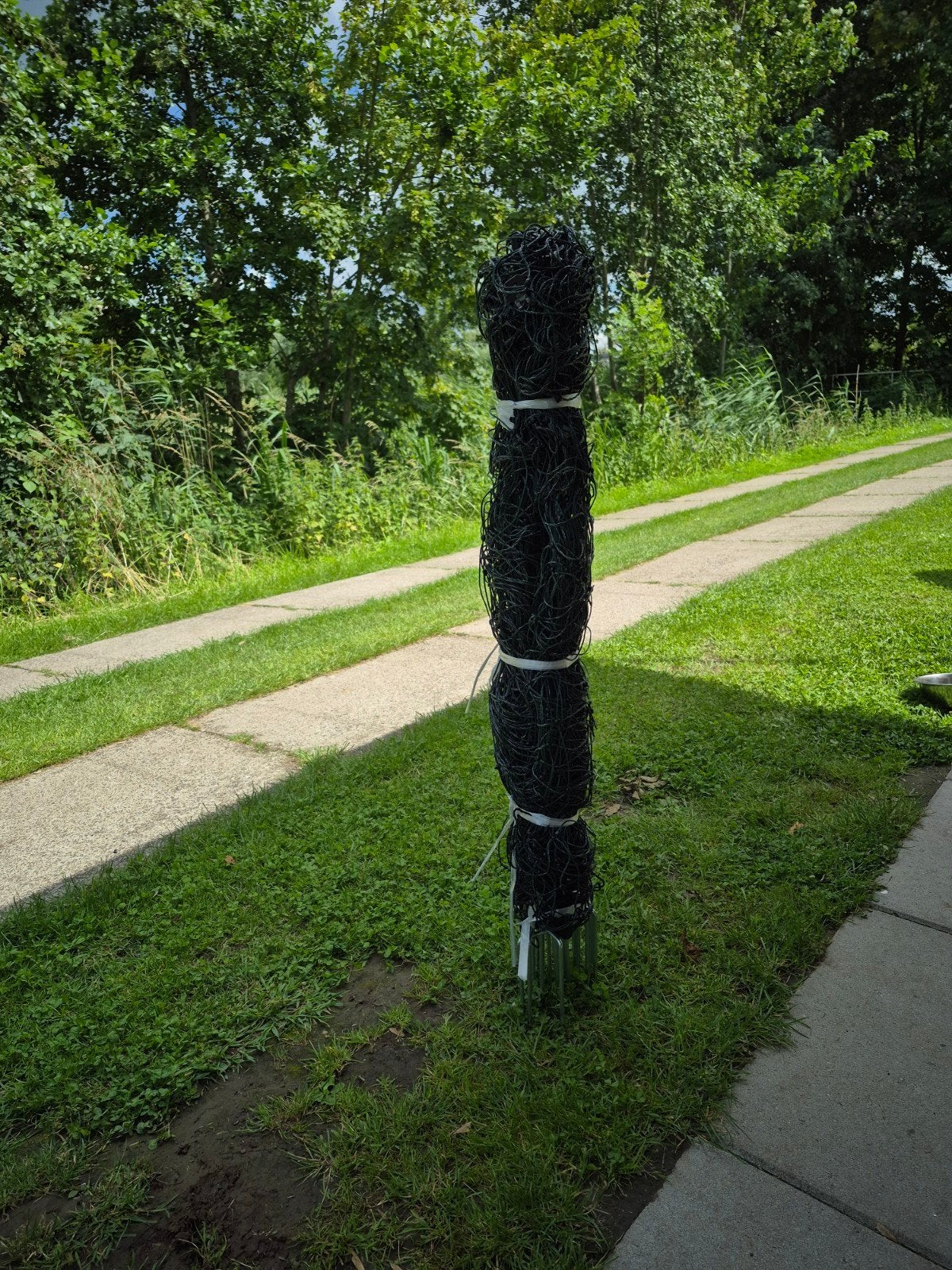 Hek om hond achter te plaatsen, Ophalen