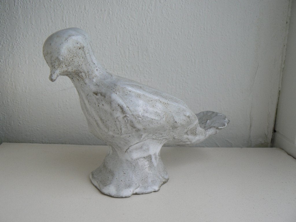 beeldje van een duif, Ophalen