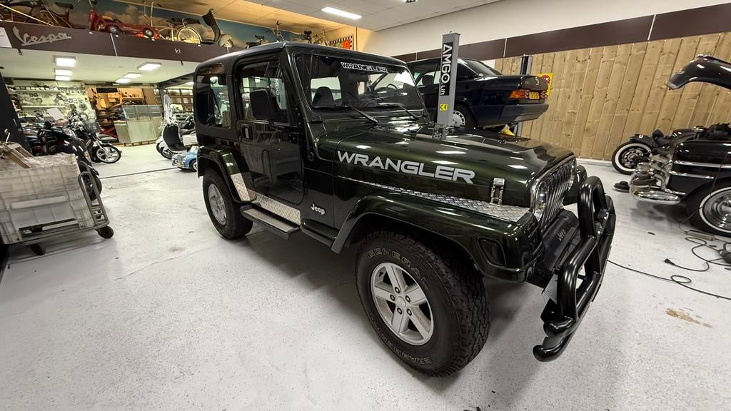 Jeep wrangler 1998 2.5l 4wd Groen hard en soft top, Auto's, 450 kg, 118 pk, 2000 kg, 4 stoelen