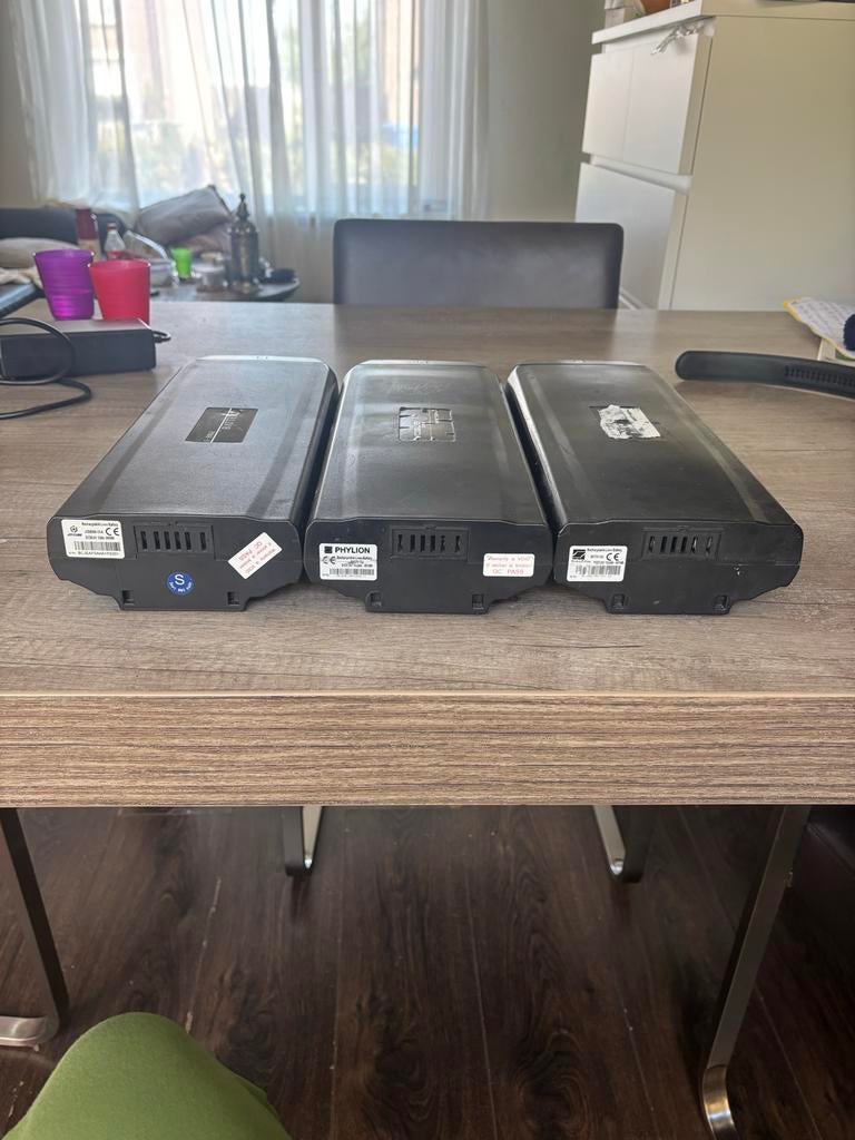 E-bike accu's en oplader - Phylion en Joycube, Ophalen of Verzenden, Gebruikt