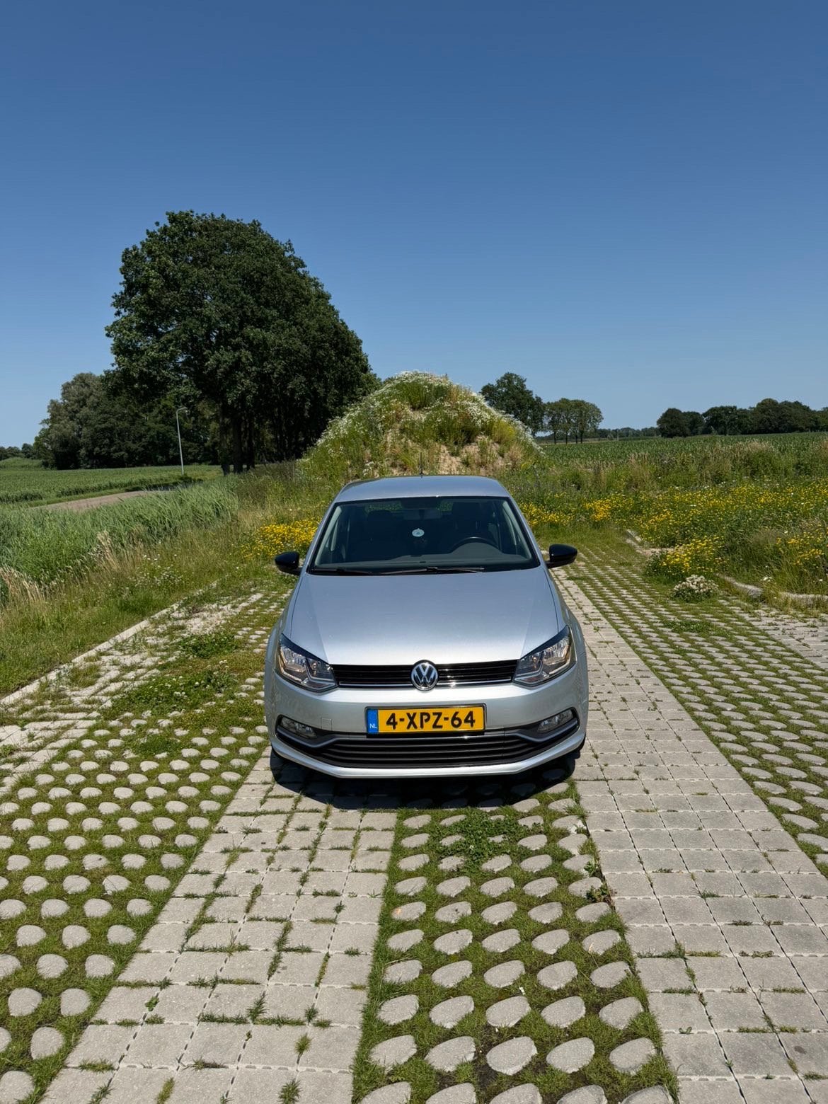 Volkswagen Polo 1.2 TSI 66KW 2014 Grijs, Auto's, 40 €/maand, 4 cilinders, Origineel Nederlands, Handgeschakeld