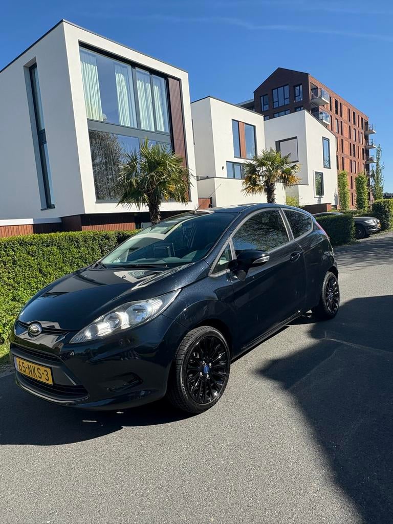 Ford Fiësta 1.25 44KW 3DR 2010 Zwart, Auto's, Voorwielaandrijving, Stof, 4 cilinders, Zwart