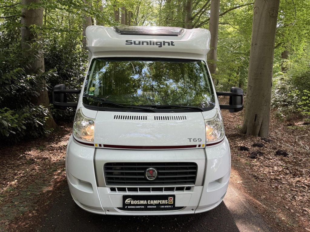 Sunlight T 69 Queensbed Airco Garage Euro 5 2013, Caravans en Kamperen, Campers, Sunlight, Ringverwarming, Airbags, Bedrijf