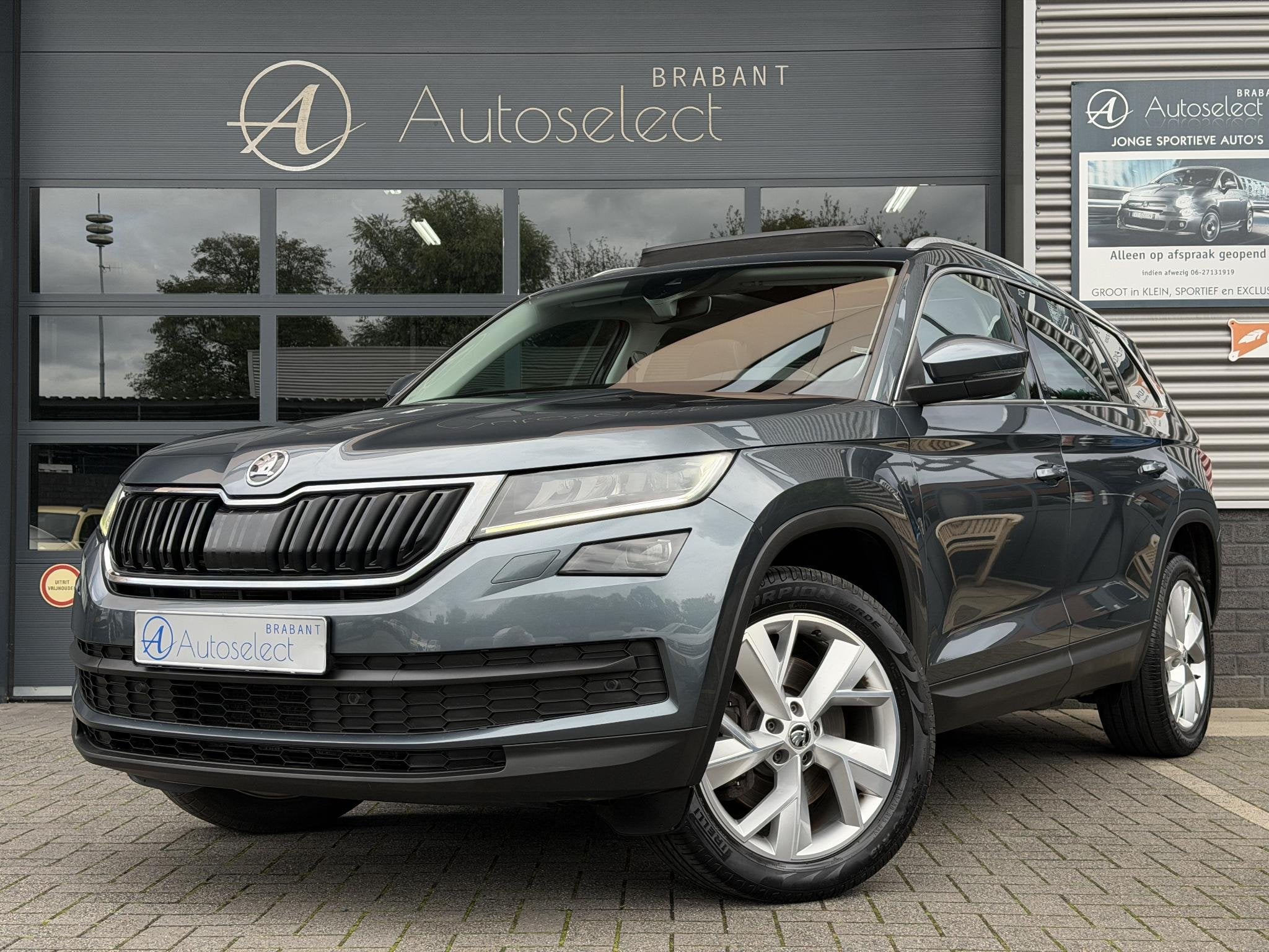 Skoda Kodiaq 2.0 TSI 4x4 Style Business Pano | Trekhaak | 18, Auto's, Automaat, Stof, Gebruikt, 4 cilinders