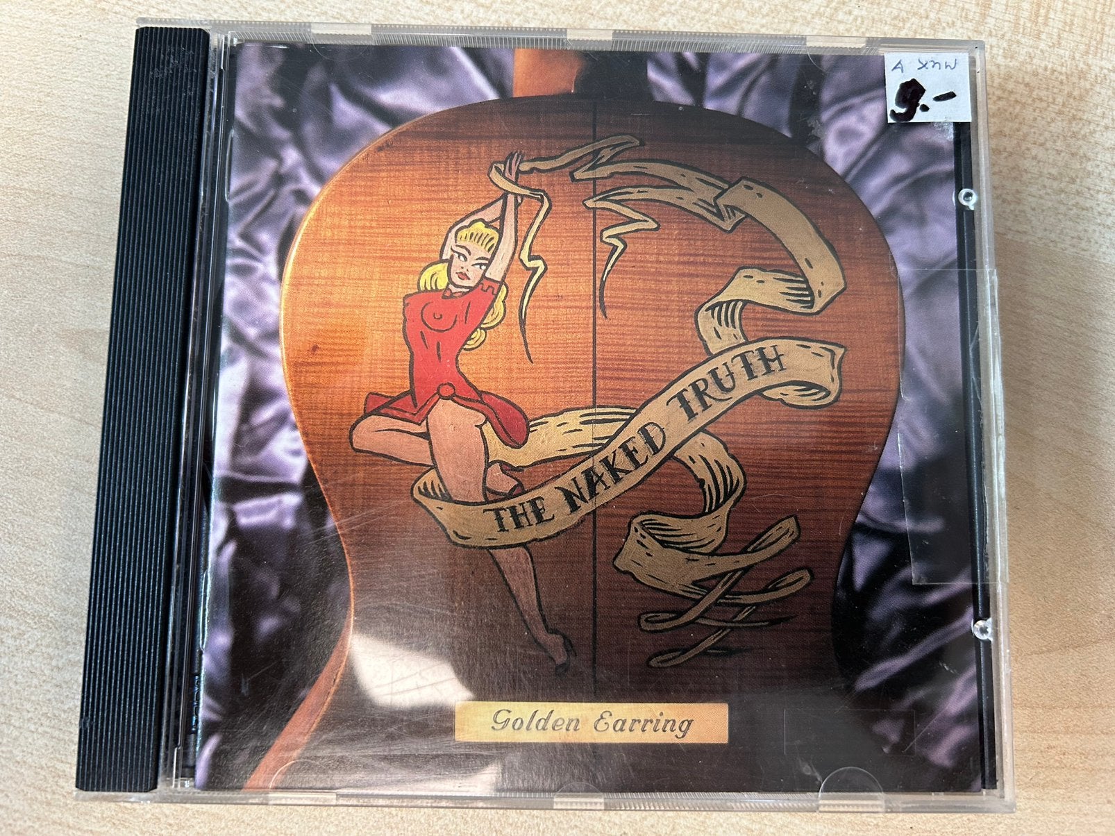 CD Golden Earring - The naked truth, Ophalen of Verzenden, Zo goed als nieuw, Poprock