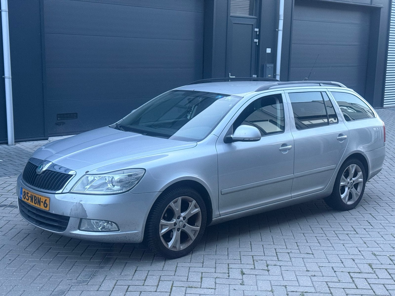 Skoda Octavia 1.2 TSI Combi DSG 2010 Grijs, Auto's, 4 cilinders, Origineel Nederlands, 600 kg, 1205 kg