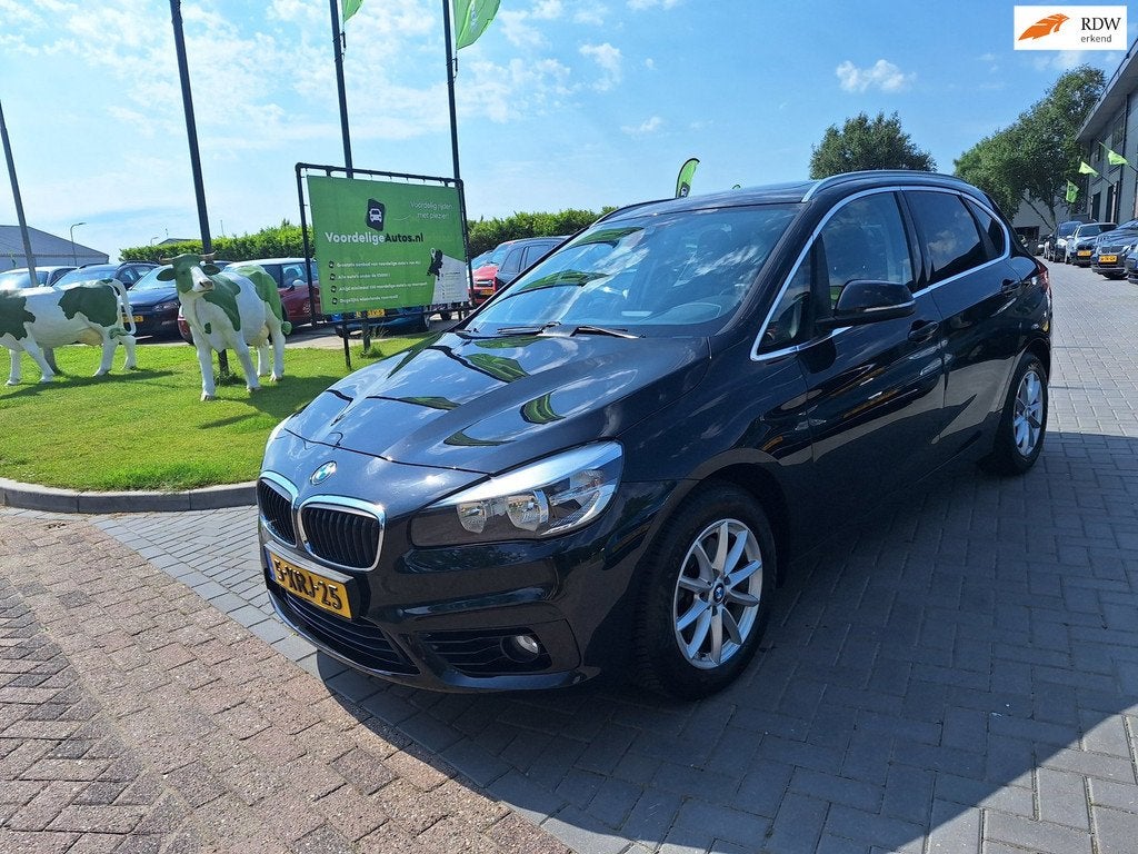 BMW 2-serie Active Tourer 218i Executive / Vol opties! / APK, Auto's, BMW, Voorwielaandrijving, 136 pk, Gebruikt, Zwart