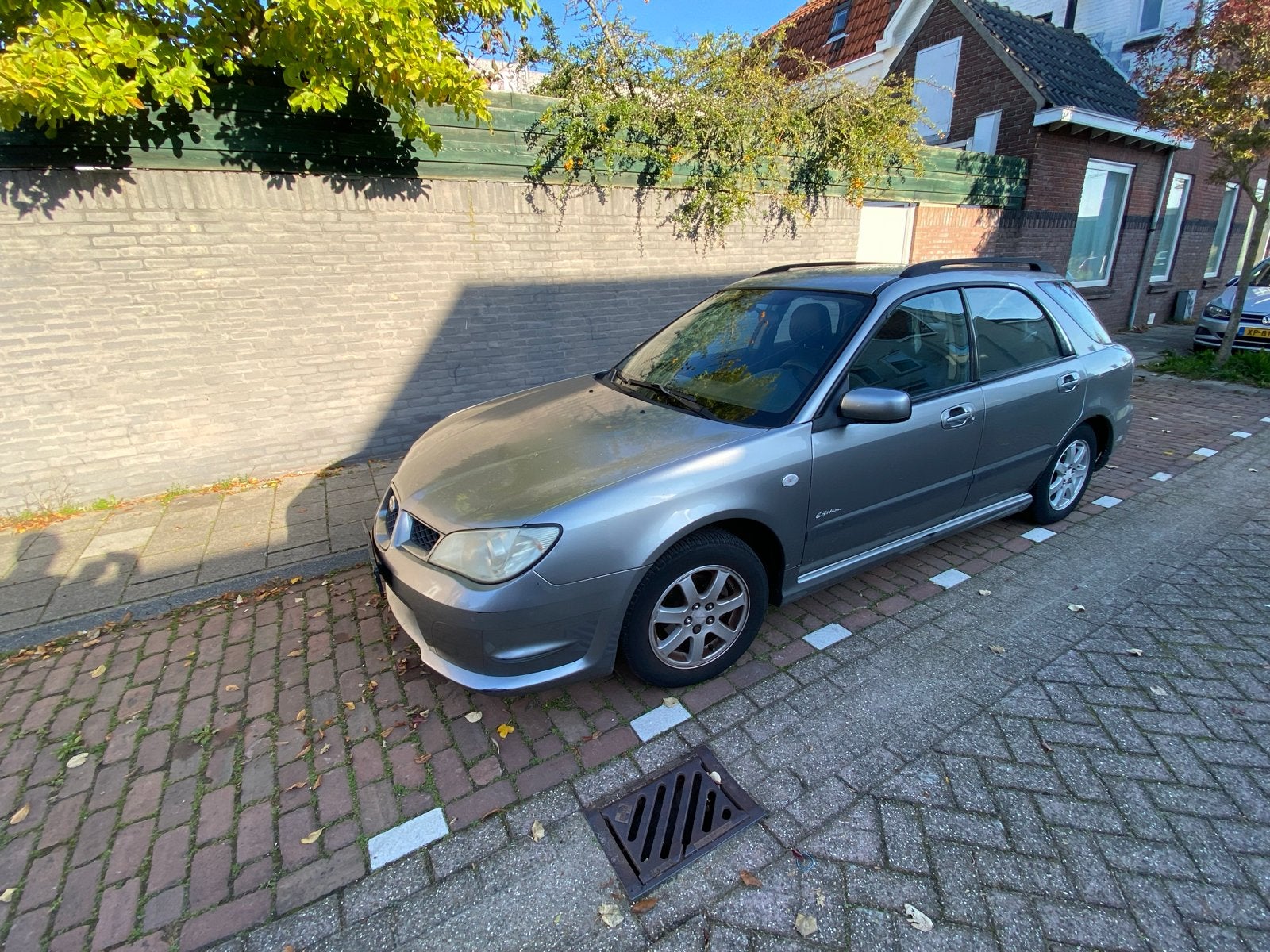 Subaru Impreza 1.5 Plus AWD 2007 Grijs, Auto's, 13 km/l, 1498 cc, 4 cilinders, Origineel Nederlands