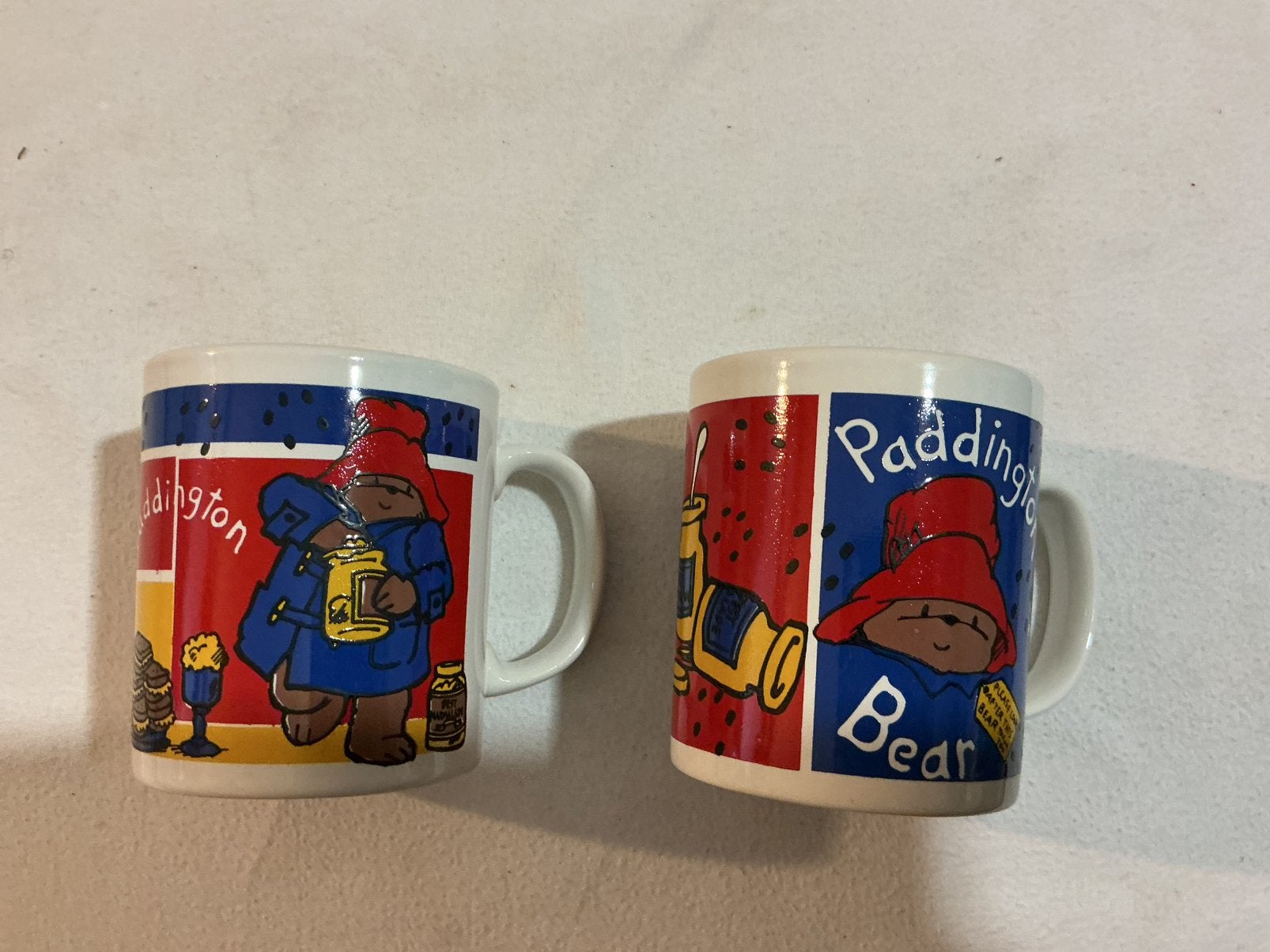 2 bekers Paddington Bear, Ophalen of Verzenden, Zo goed als nieuw, Overige stijlen, Kop(pen) en/of Schotel(s)