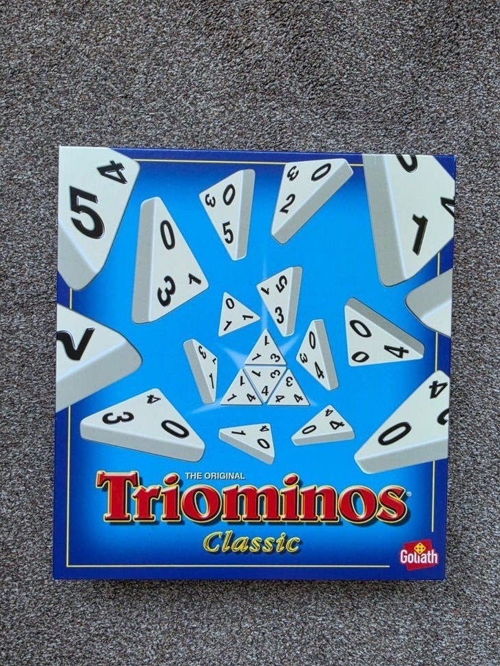 Triominos Classic - Het originele driehoekdominospel, Drie of vier spelers, Ophalen of Verzenden, Zo goed als nieuw, Goliath