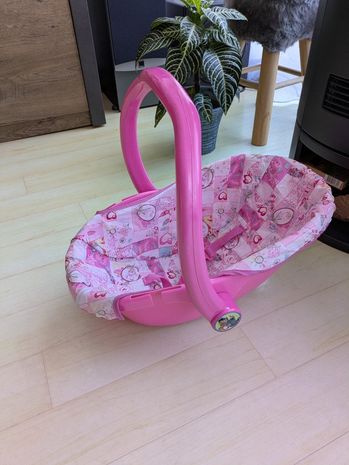 Baby Born maxicosi, Ophalen