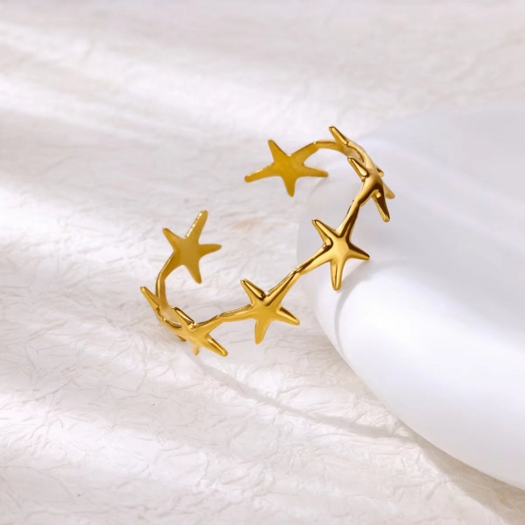 Goudkleurige Dames Zeester Armband, Verzenden, Nieuw, Goud, Staal