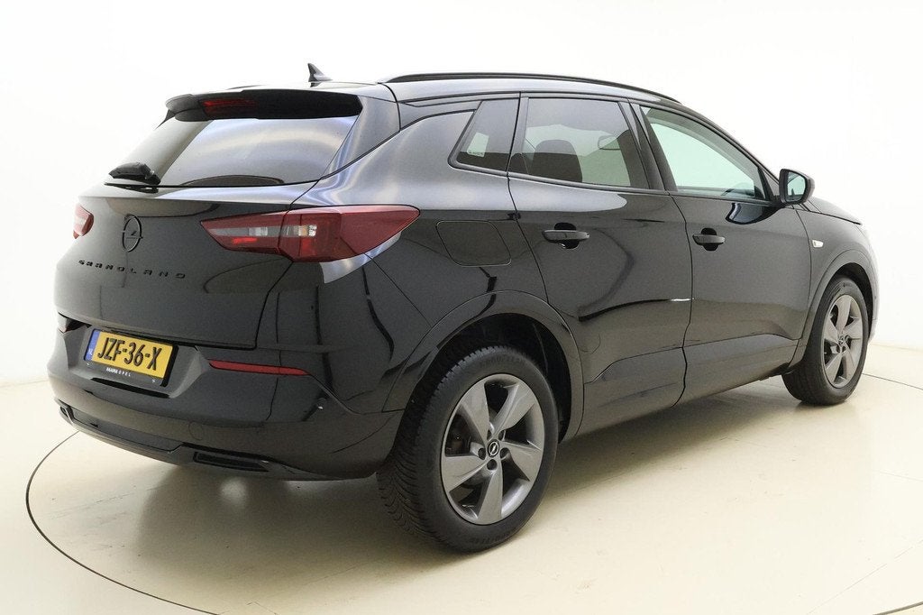 Opel Grandland 1.2 Turbo GS Line 130 PK | Navigatie | Camera, Auto's, Opel, Gebruikt, 1199 cc, Leder en Stof, Zwart
