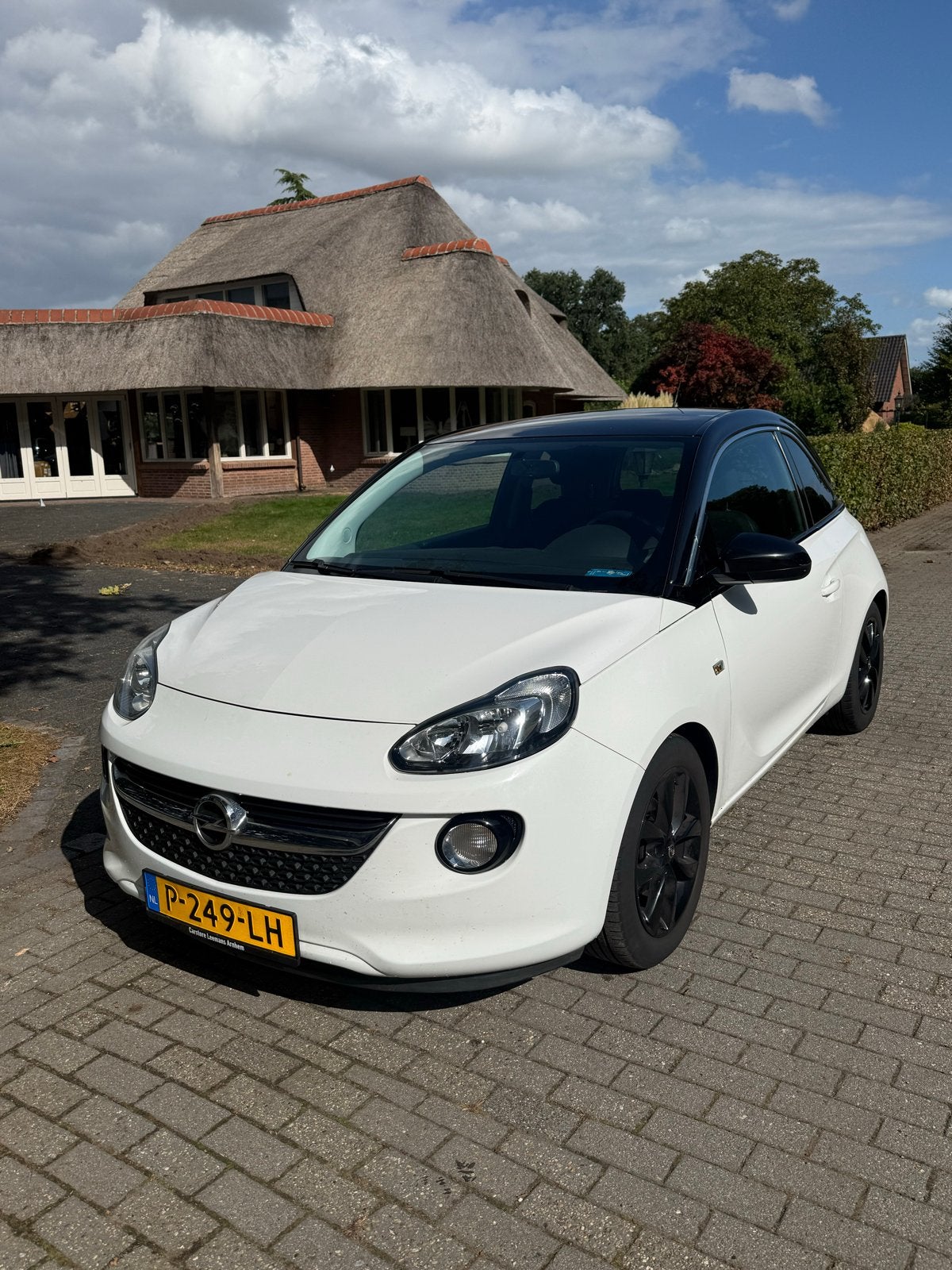 Opel Adam 1.2 Glam – Bouwjaar 2015, Auto's, Voorwielaandrijving, 40 €/maand, Zwart, 4 stoelen