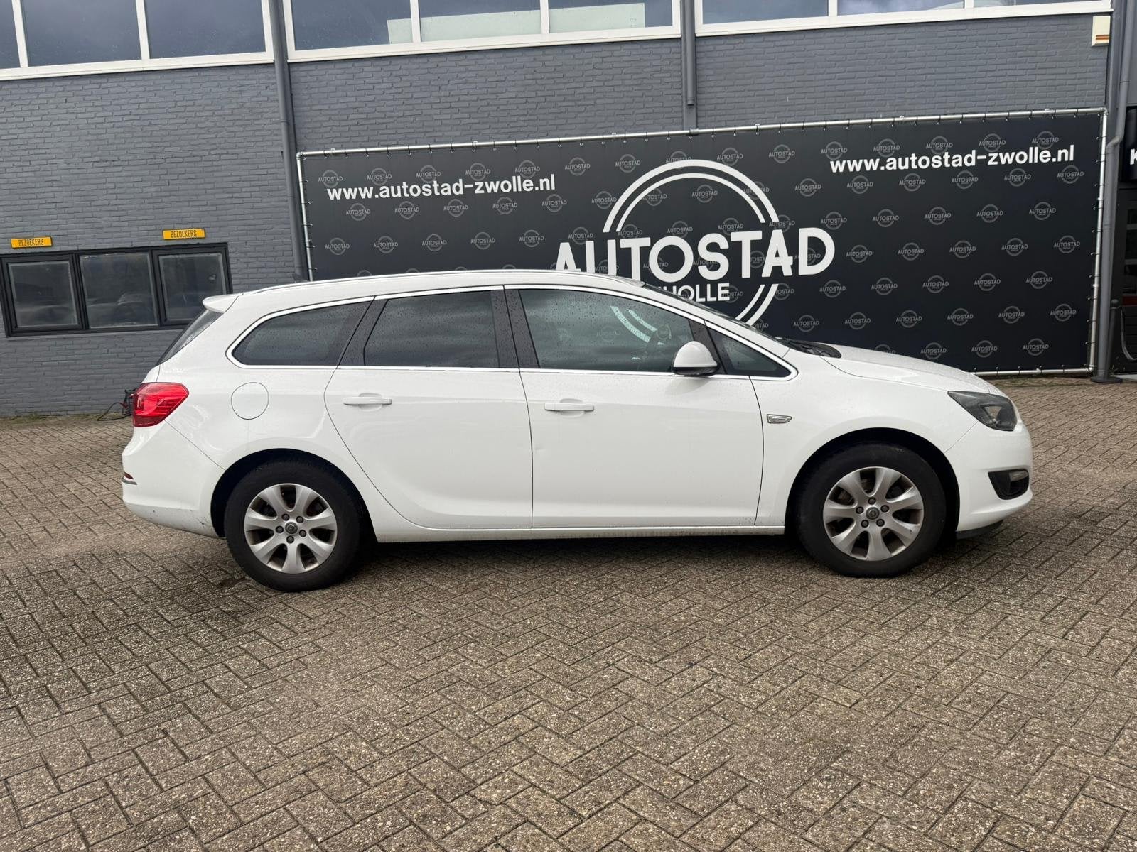 Opel Astra Sports Tourer 1.6 CDTi Business + Ketting Maakt L, Auto's, Opel, Voorwielaandrijving, Gebruikt, 4 cilinders, Wit