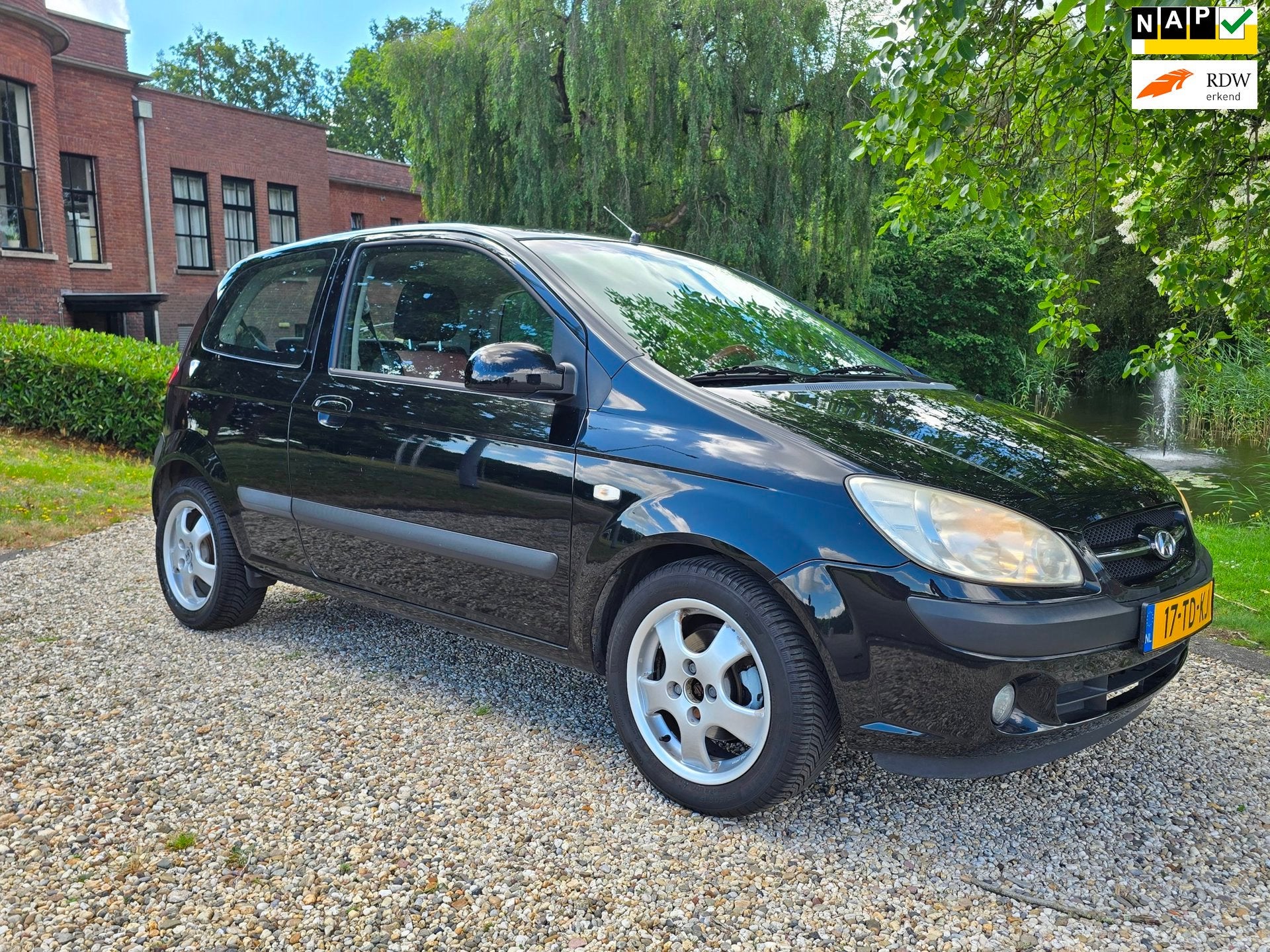 Hyundai Getz 1.4i First Edition AIRCO *87.000km*, Auto's, Hyundai, Voorwielaandrijving, 450 kg, 4 cilinders, Zwart