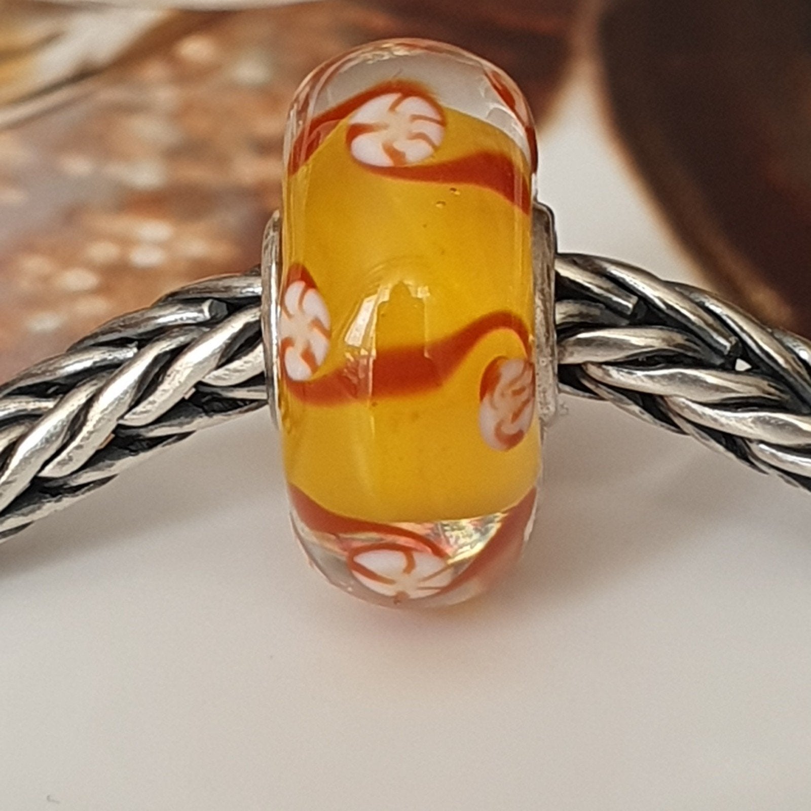 Leuke Trollbeads Uniekie     Oranje/Rood met Bloemmotief, Glas of Kristal, Ophalen of Verzenden, Zo goed als nieuw, Trollbeads