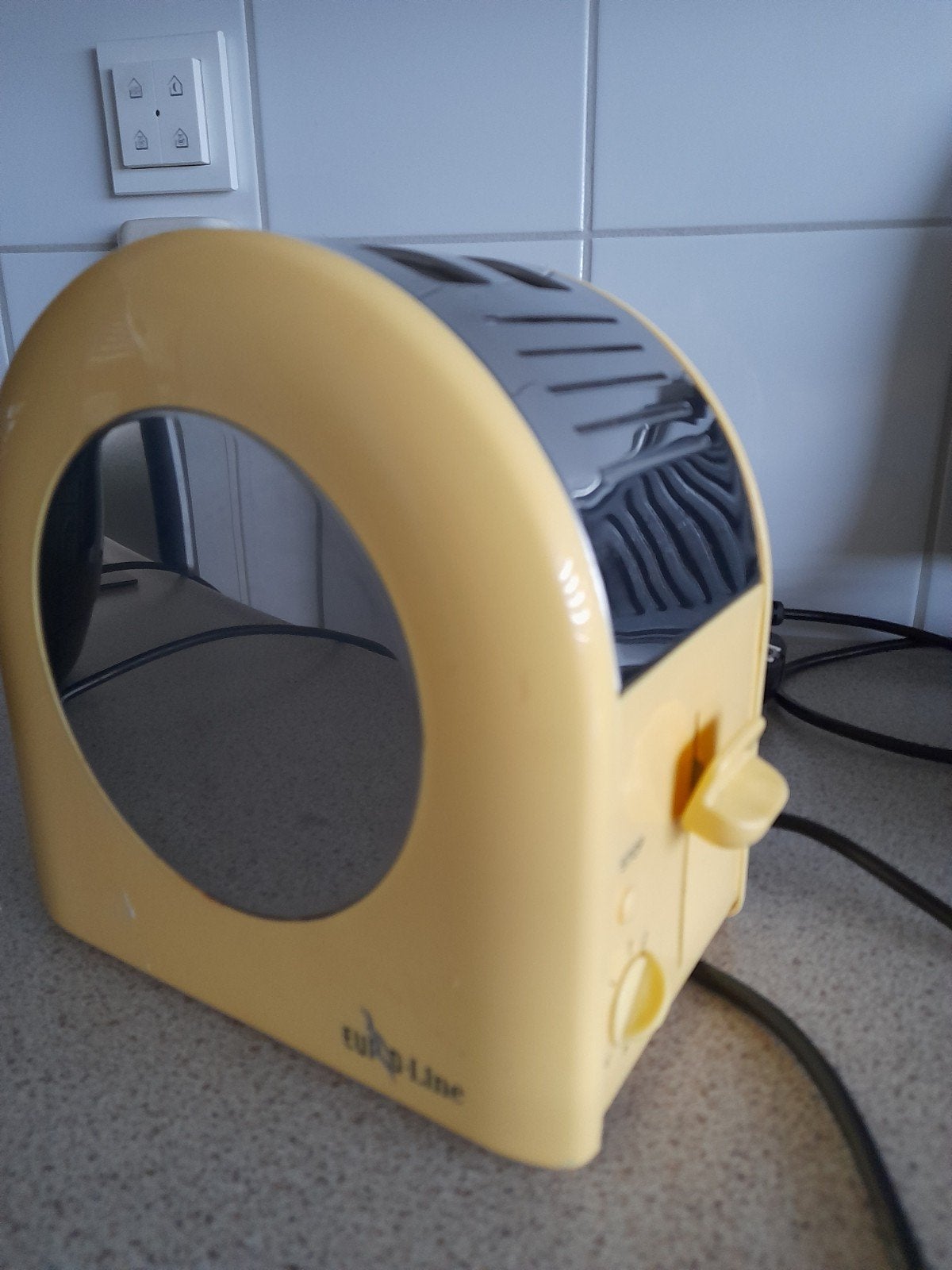 Leuke gele broodrooster, Ophalen