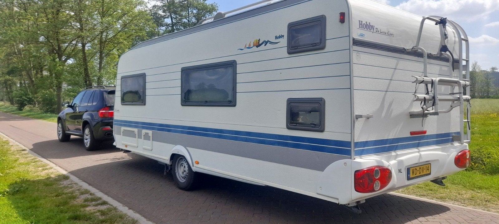 Hobby Caravan 560KMFE stapelbed, Caravans en Kamperen, Caravans, Schokbreker, Omvormbare zithoek, Rondzit, Hobby