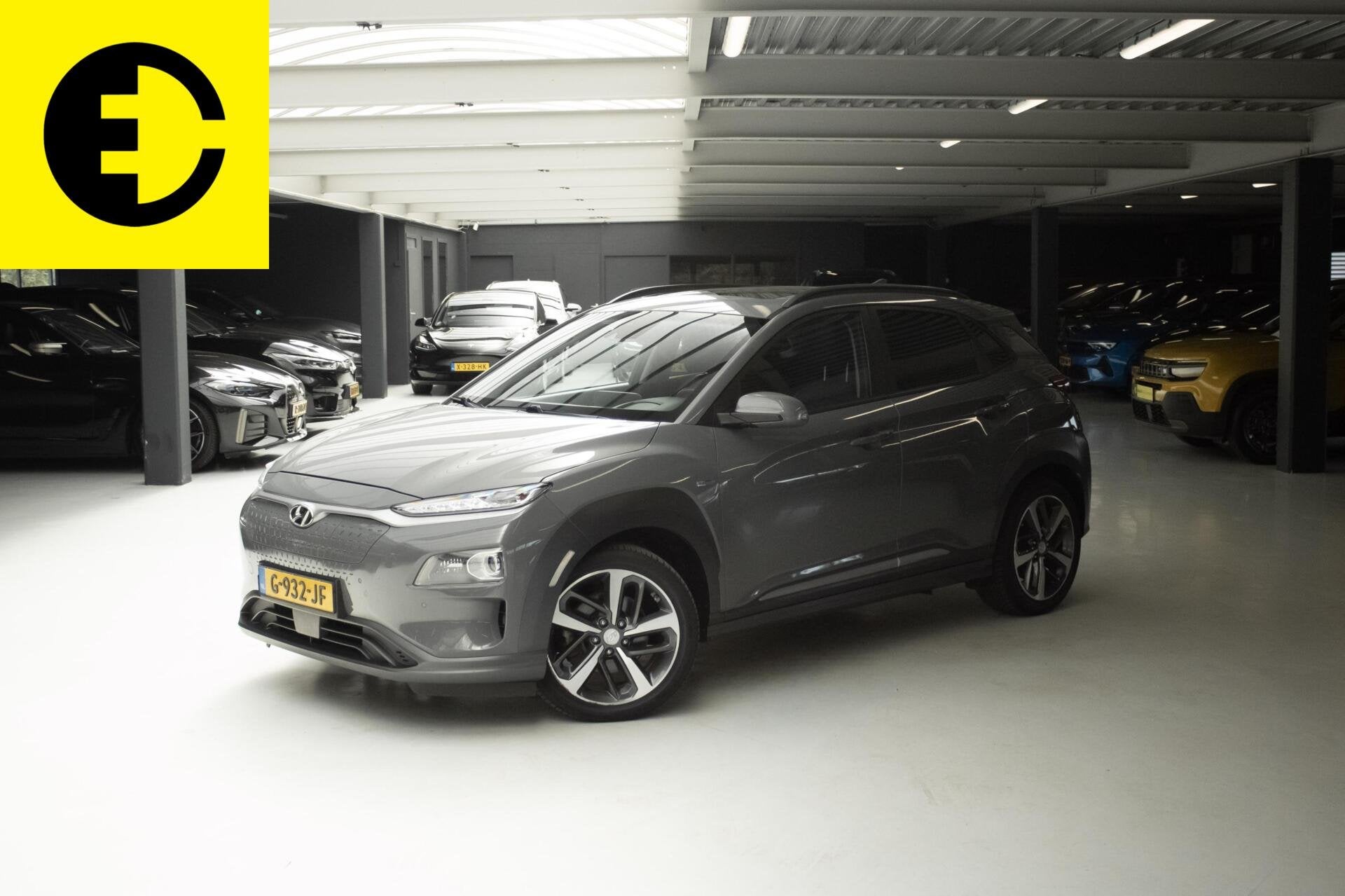 Hyundai Kona EV Premium 64 kWh | SOH 89,6% | Stoelverkoeling, Auto's, Gebruikt, Zwart, 630 min, 64 kWh