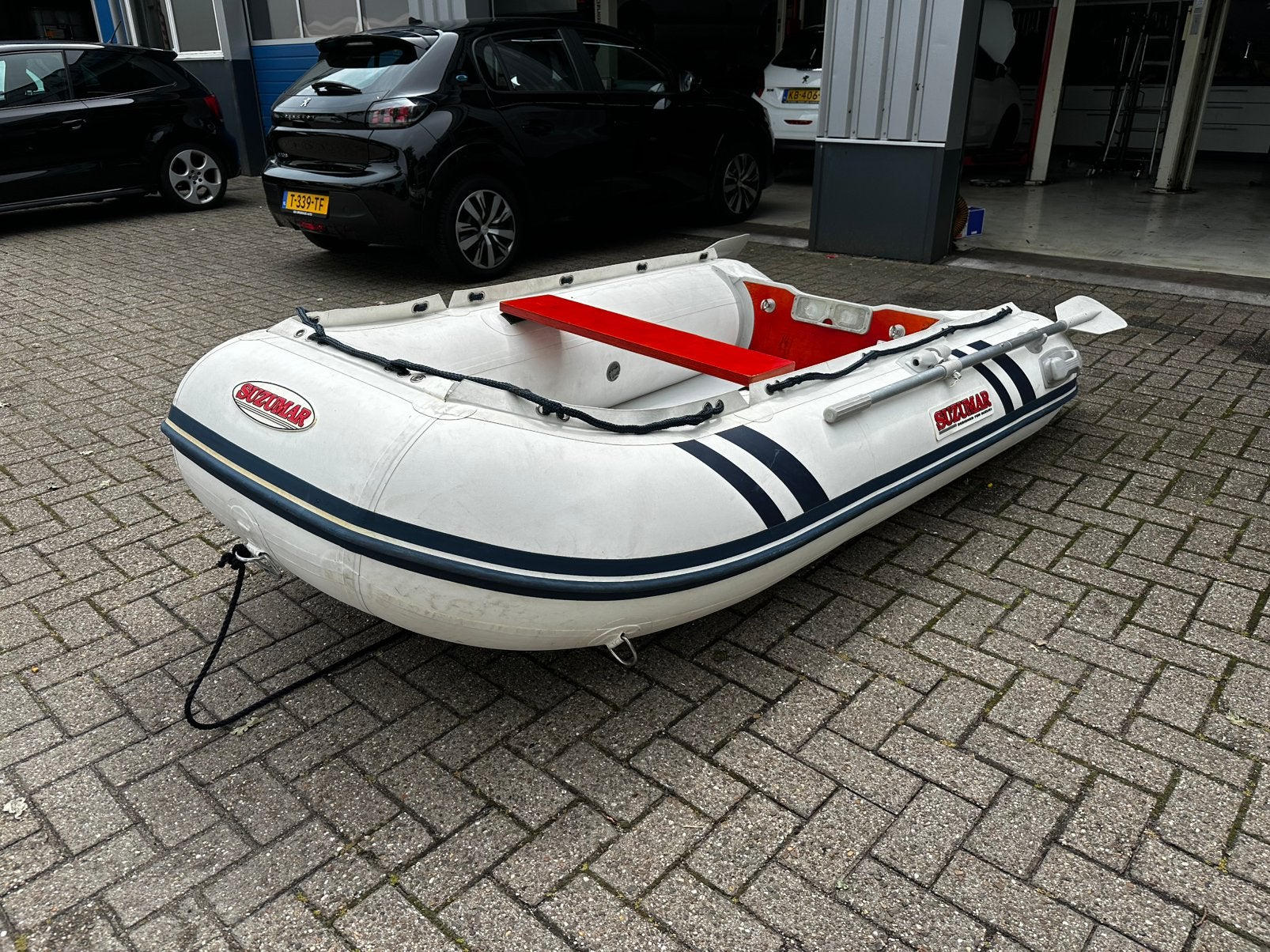 Suzumar rubberboot + 4pk suzuki motor, Watersport en Boten, Ophalen, Zo goed als nieuw, Buitenboordmotor, Suzumar