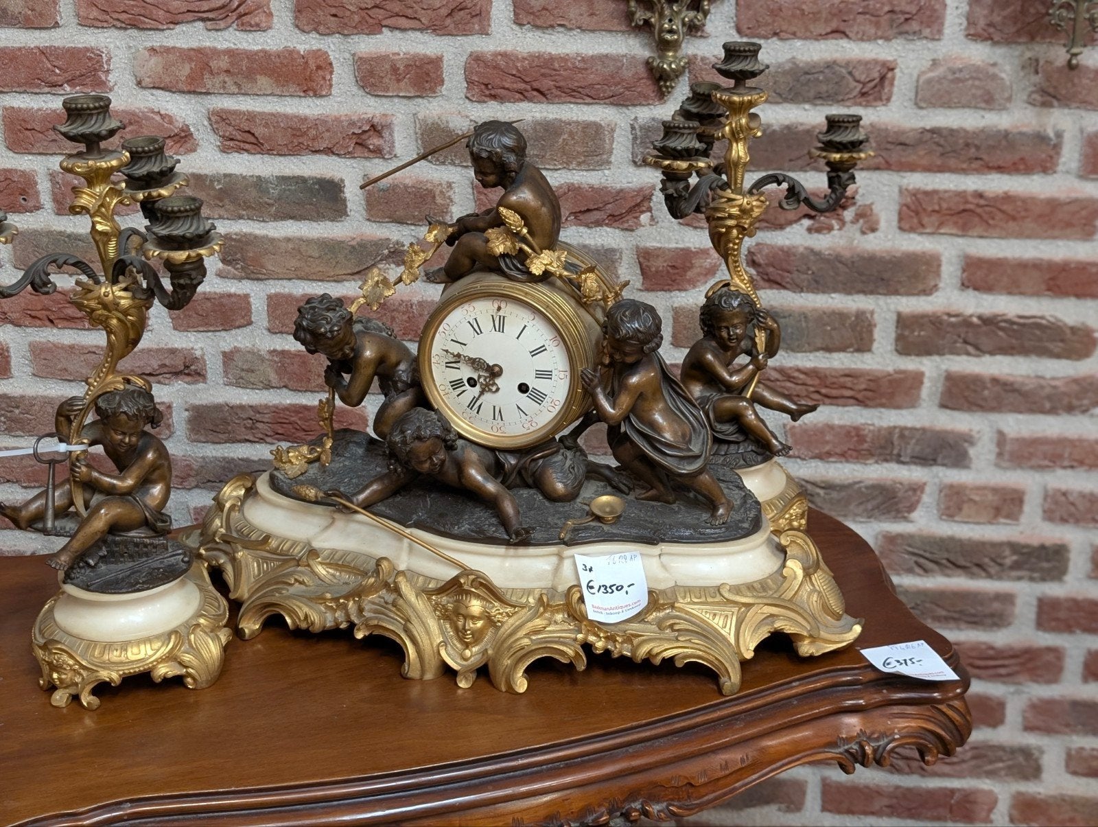 groot antiek bronzen klok stel.klok 58 breed 40 hoog. €1350, Ophalen