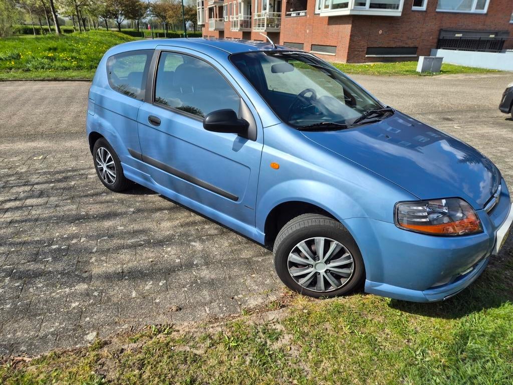 Chevrolet Kalos apk tot 28-10-26, Voorwielaandrijving, Stof, Blauw, Handgeschakeld