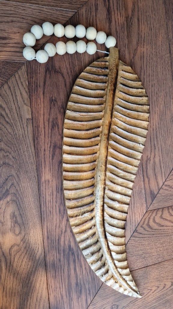 Houten veer hanger, Huis en Inrichting, Woonaccessoires | Wanddecoraties, Ophalen of Verzenden, Zo goed als nieuw, Hout, Wandhanger