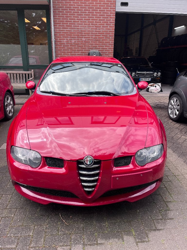 Alfa Romeo 147 Gta optische opknapper, Auto's, Alfa Romeo, Voorwielaandrijving, Zwart, Automatische klimaatregeling, Handgeschakeld
