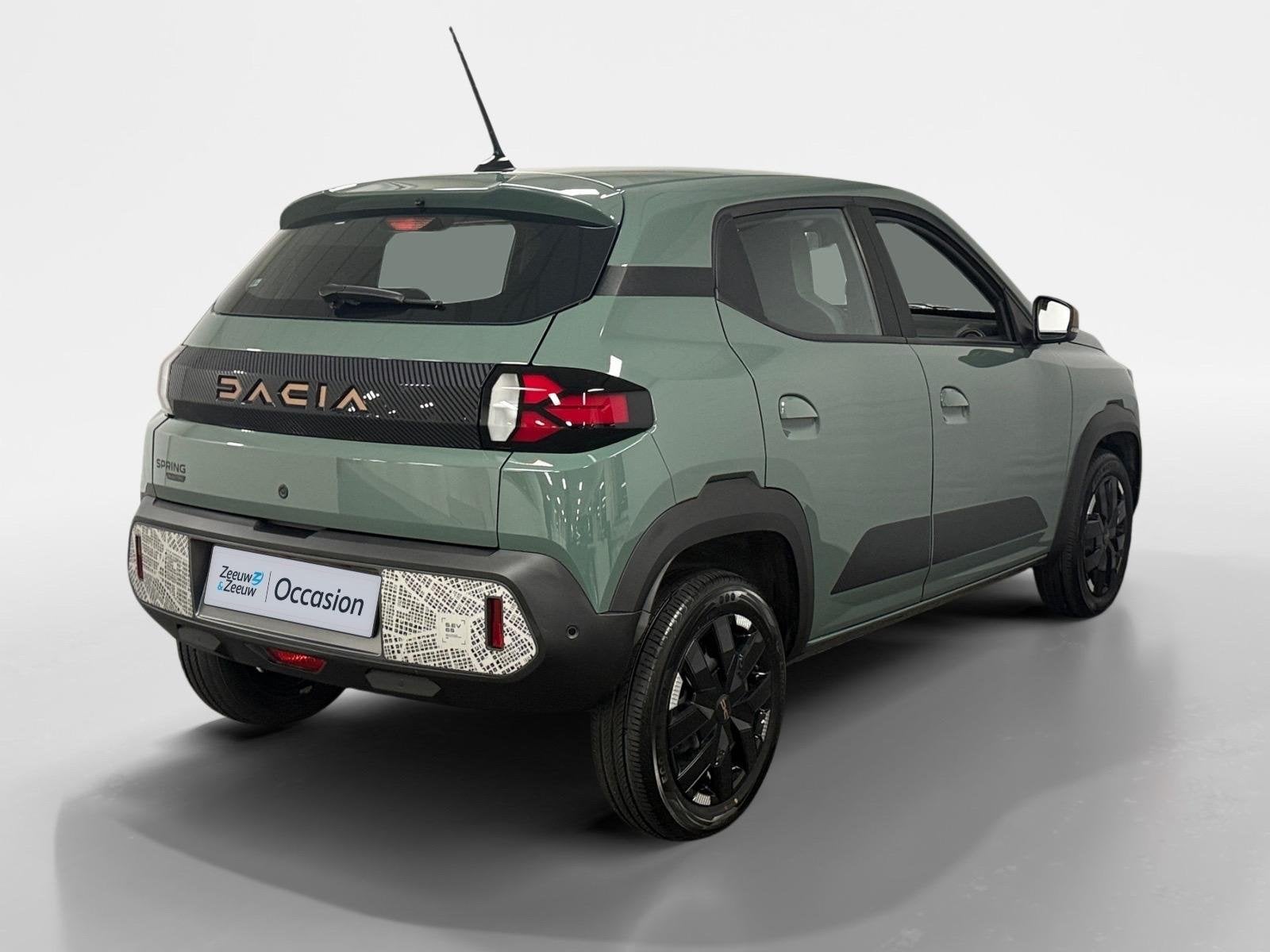Dacia Spring Extreme 65 26.8 kWh AUTOMAAT CAMERA APPLE CARPL, Auto's, Dacia, 12 maanden, Gebruikt, 4 stoelen, Leder en Stof
