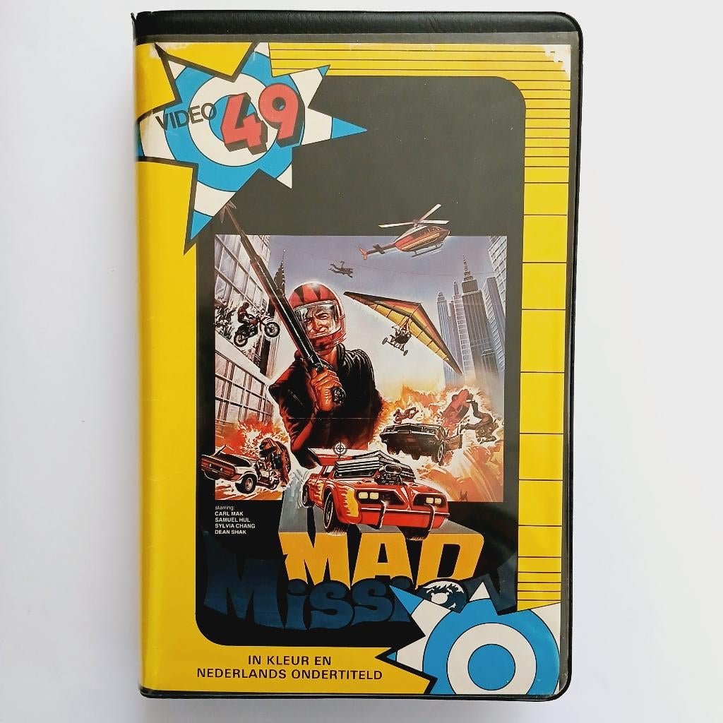 Mad Mission - NL ex rental vhs - Video 49, Cd's en Dvd's, VHS | Film, Gebruikt, Actie en Avontuur, Alle leeftijden, Verzenden