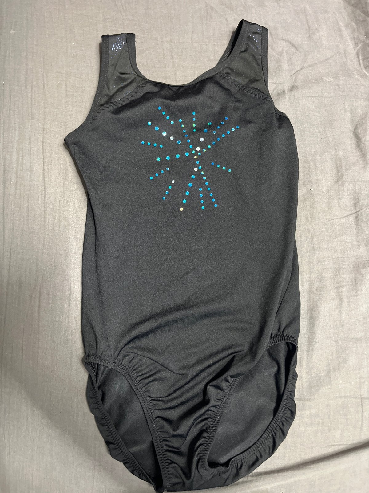 Zwart turnpakje met glitterdetails, Zwart, Ophalen of Verzenden, Zo goed als nieuw, Kleiner dan kindermaat 122