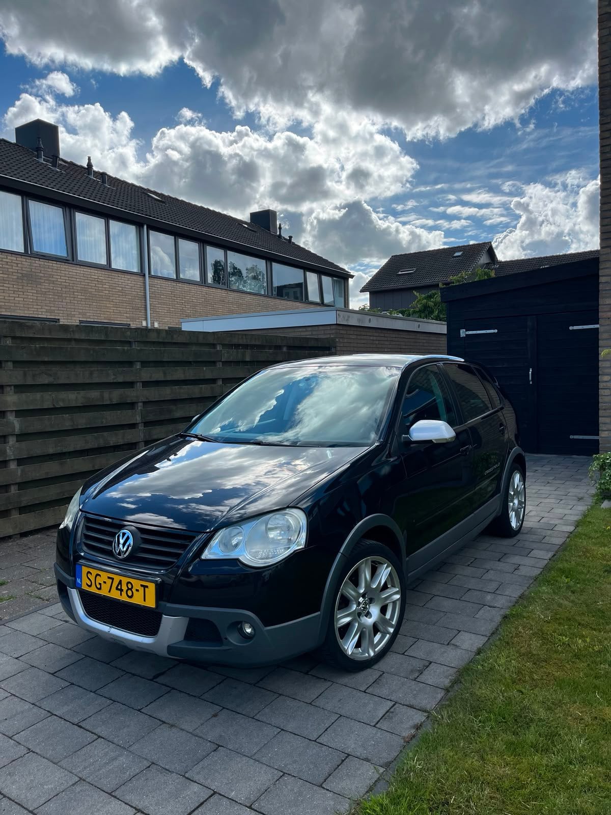 Volkswagen Polo 1.4 16V 59KW Cross 2007 Zwart, Auto's, Voorwielaandrijving, Zwart, Mistlampen, Handgeschakeld