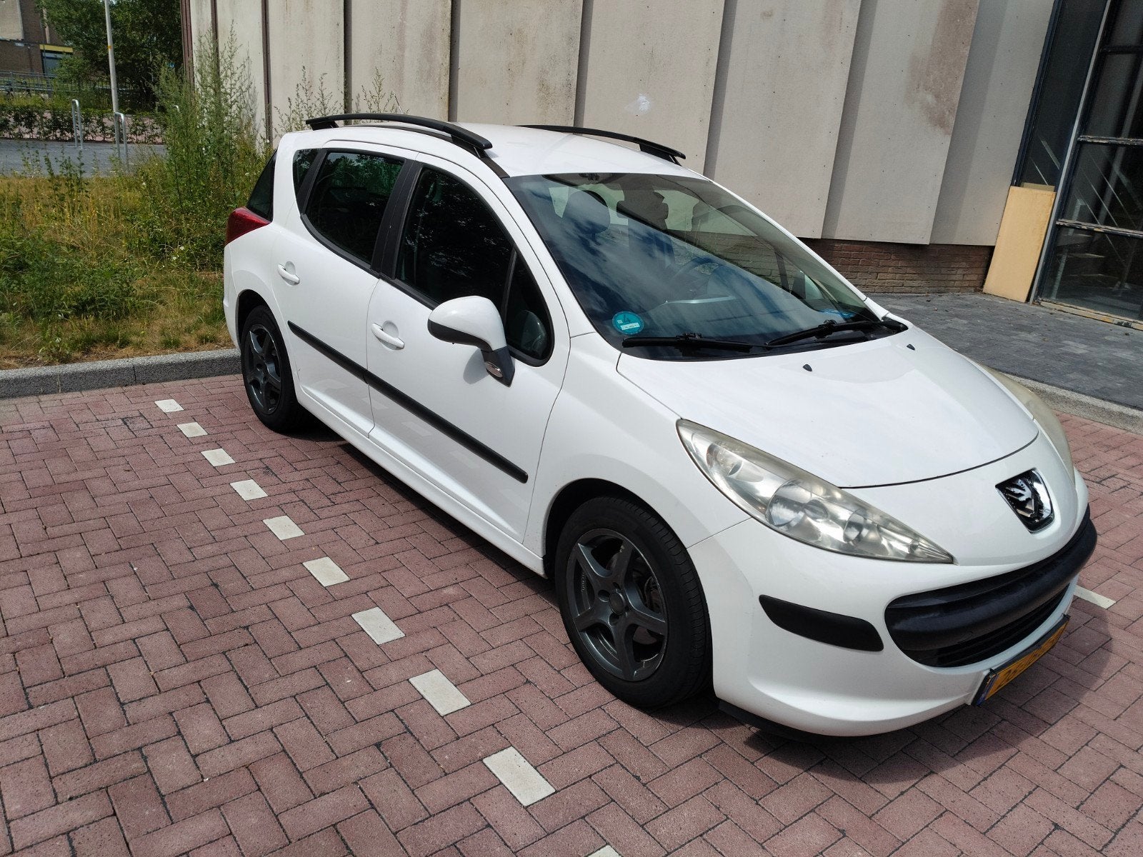 Peugeot 207 1.4 95pk 2009 Wit, Auto's, Voorwielaandrijving, Stof, Wit, Origineel Nederlands