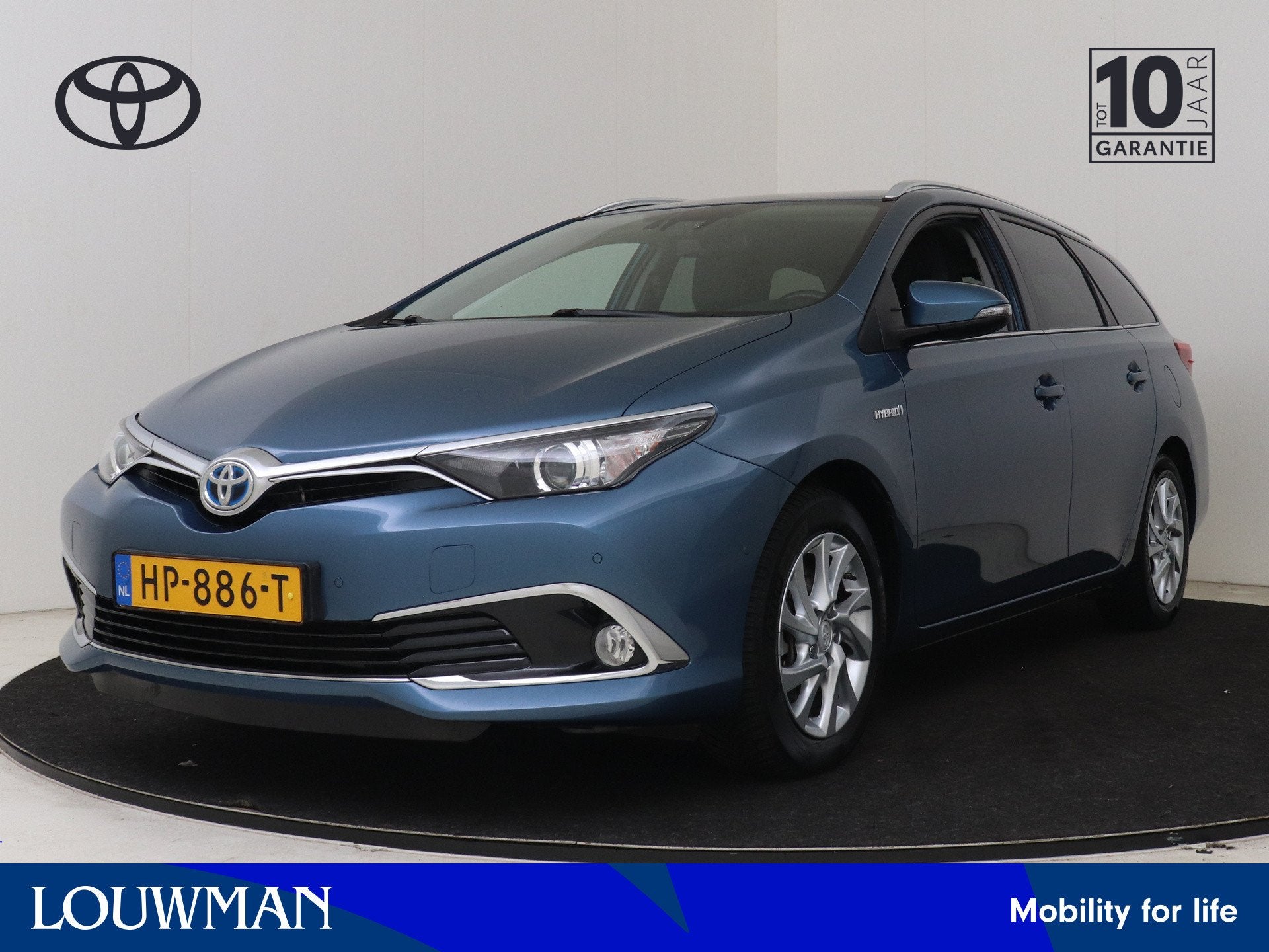 Toyota Auris Touring Sports 1.8 Hybrid Executive | Dealer on, Gebruikt, Blauw, Leder en Stof, Origineel Nederlands